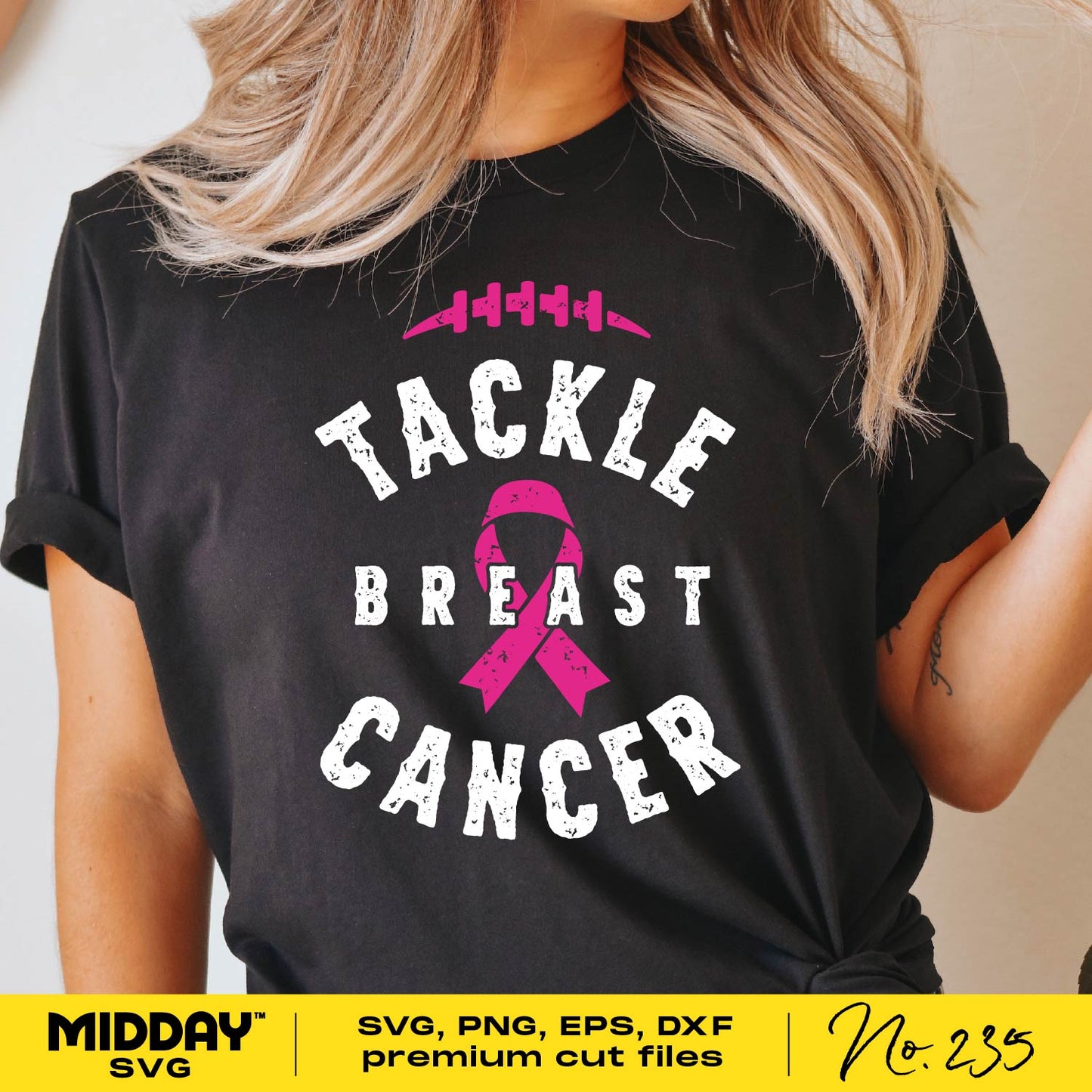 Woman wearing Tackle Breast Cancer t-shirt with football and pink ribbon design, promoting breast cancer awareness. Ideal for crafting.