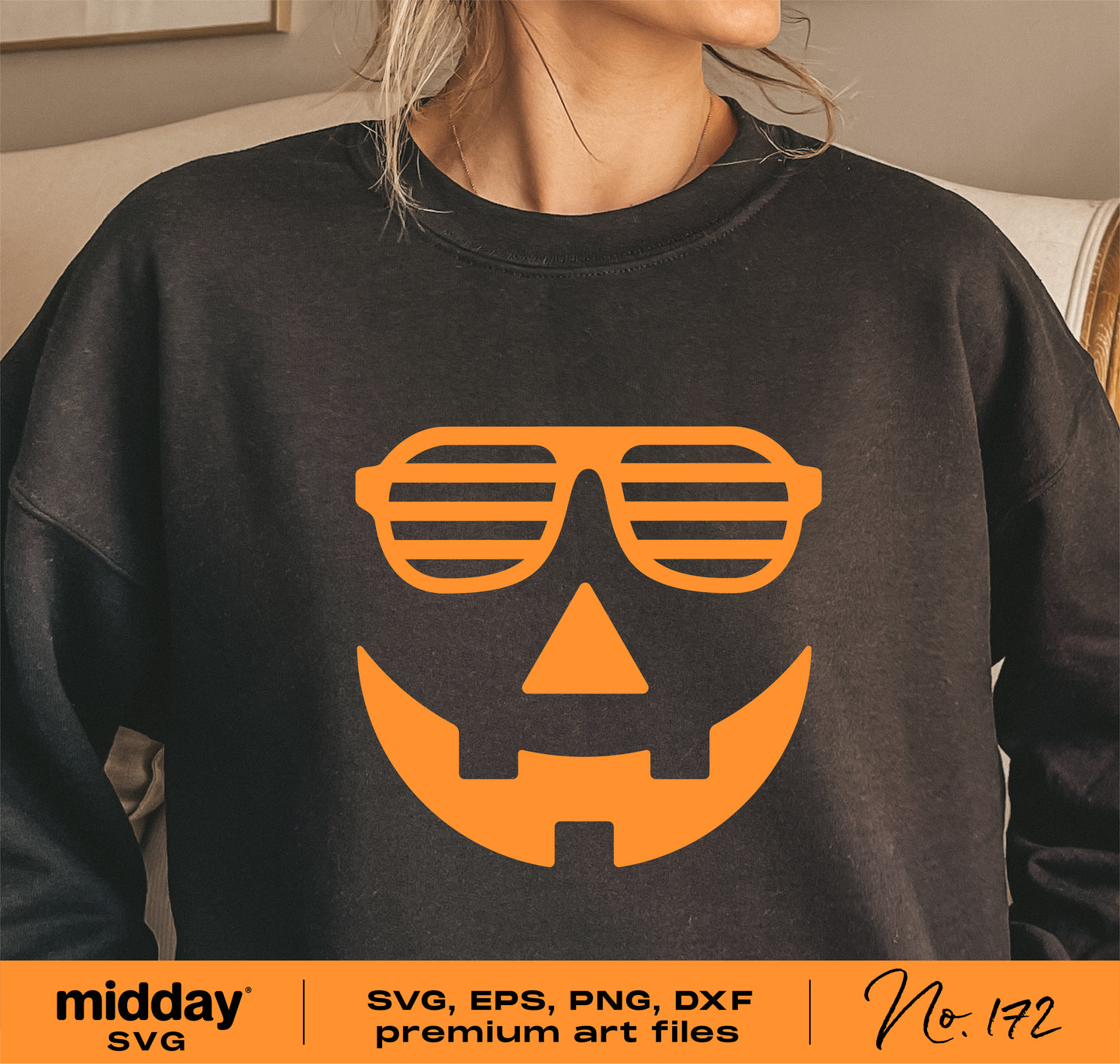 Black sweatshirt with a bright orange jack-o'-lantern face wearing sunglasses, part of Halloween SVG bundle for Cricut and sublimation