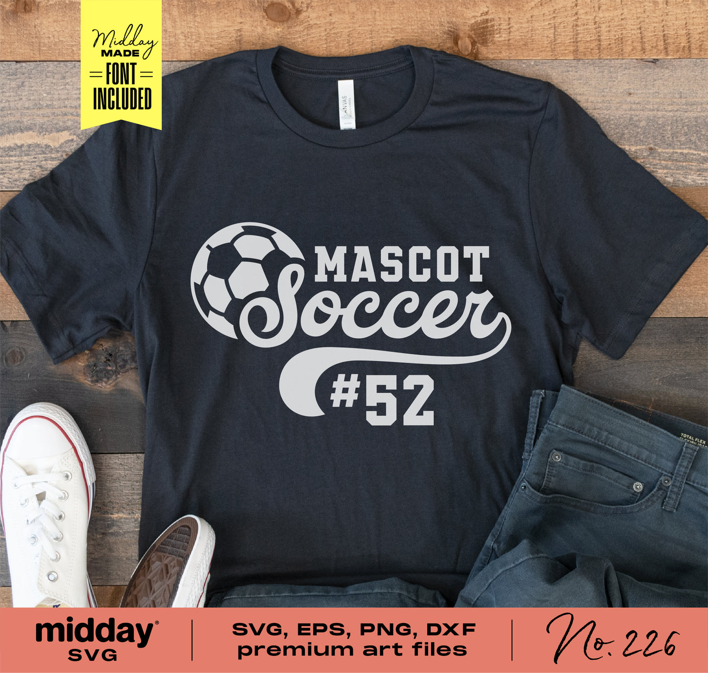Soccer team template bundle t-shirt with "Mascot Soccer #52" design, paired with casual shoes and jeans on a wooden background.