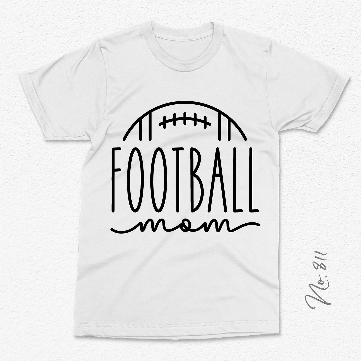 White t-shirt with 'Football Mom' design featuring a football graphic, perfect for showcasing team spirit and support for your football star.