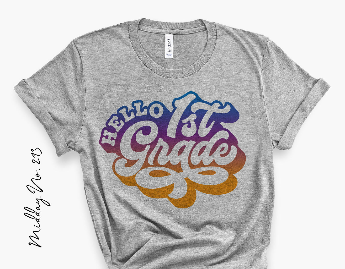 Gray t-shirt with 'Hello 1st Grade' colorful retro design, perfect for first day of school or teacher gifts.