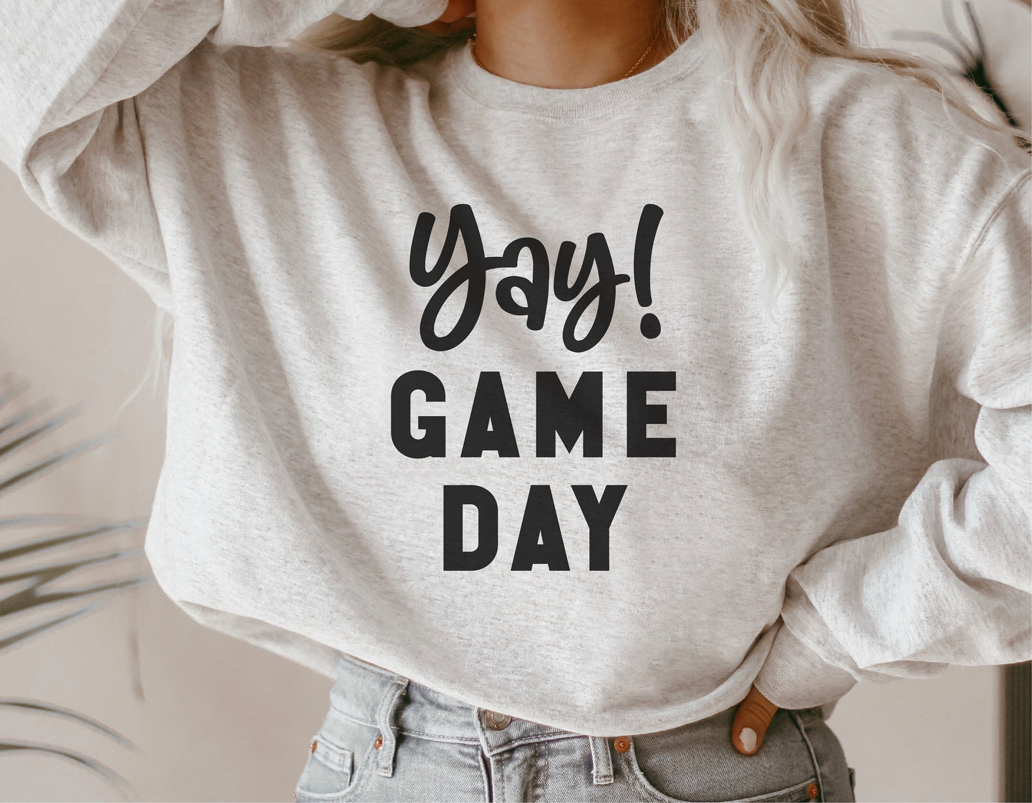 Woman wearing 'Yay! Game Day' shirt, perfect for moms supporting baseball, football, basketball, softball, and soccer teams, ideal for youth sports.