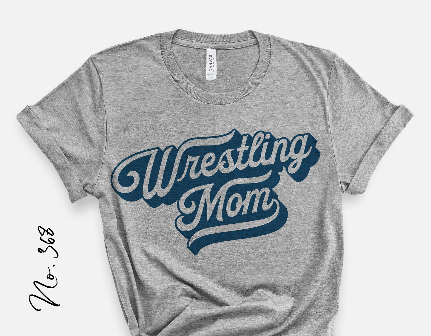 Gray t-shirt with blue 'Wrestling Mom' graphic design, ideal for school spirit and team support, suitable for Cricut and Silhouette cutting.