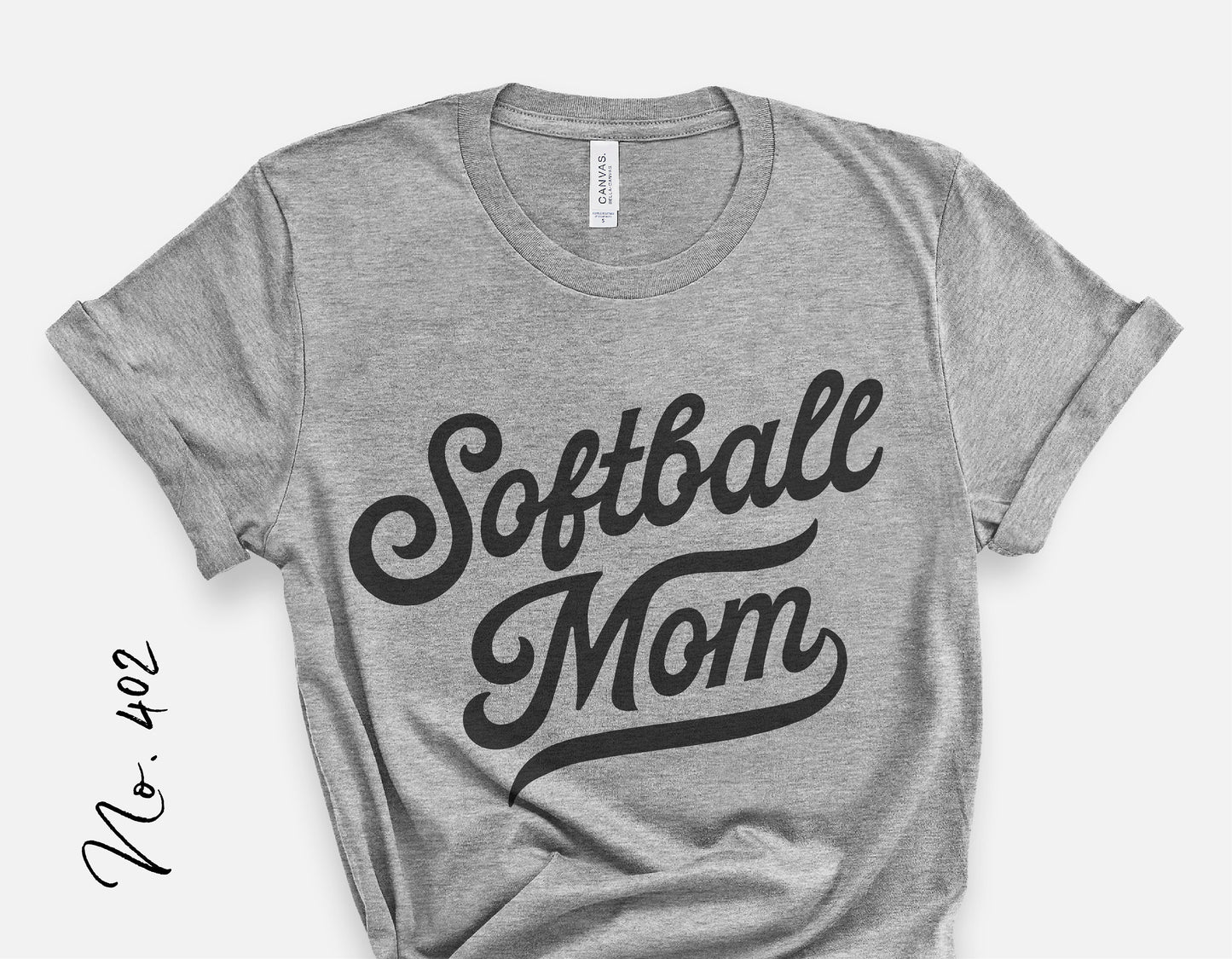 Vintage Softball Mom shirt in gray with stylish script, perfect for sports fans, available in Cricut and Silhouette cut file formats.