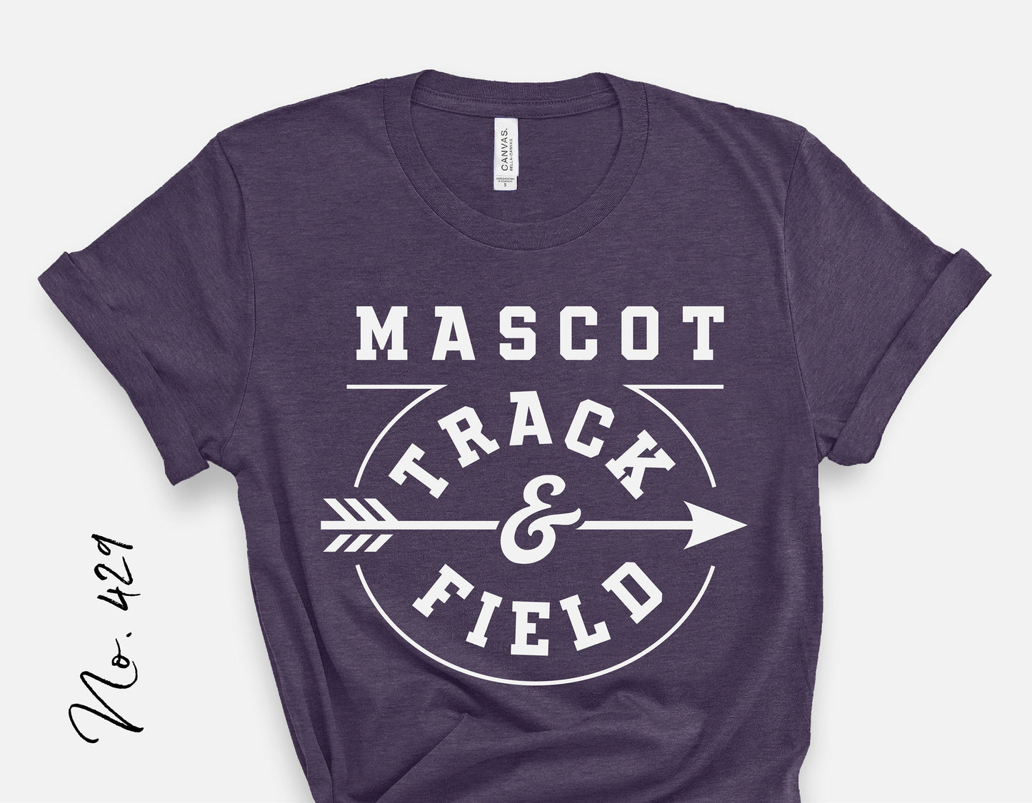 Purple t-shirt with 'Mascot Track & Field' design in white lettering and arrow graphic, perfect for sports fans and athletes.