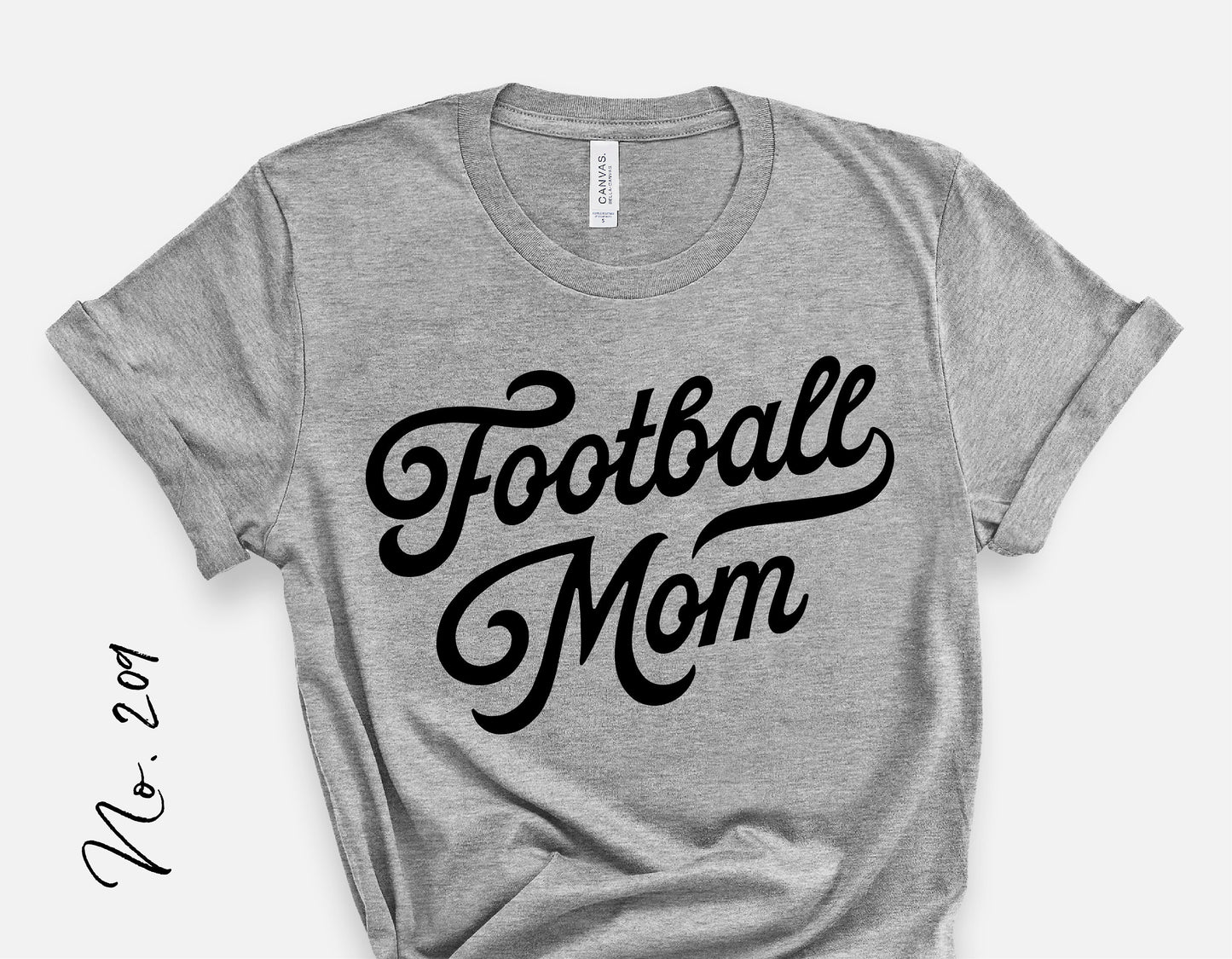 Gray t-shirt featuring cursive 'Football Mom' design, ideal for sports enthusiasts and football supporters, available as digital cut file.