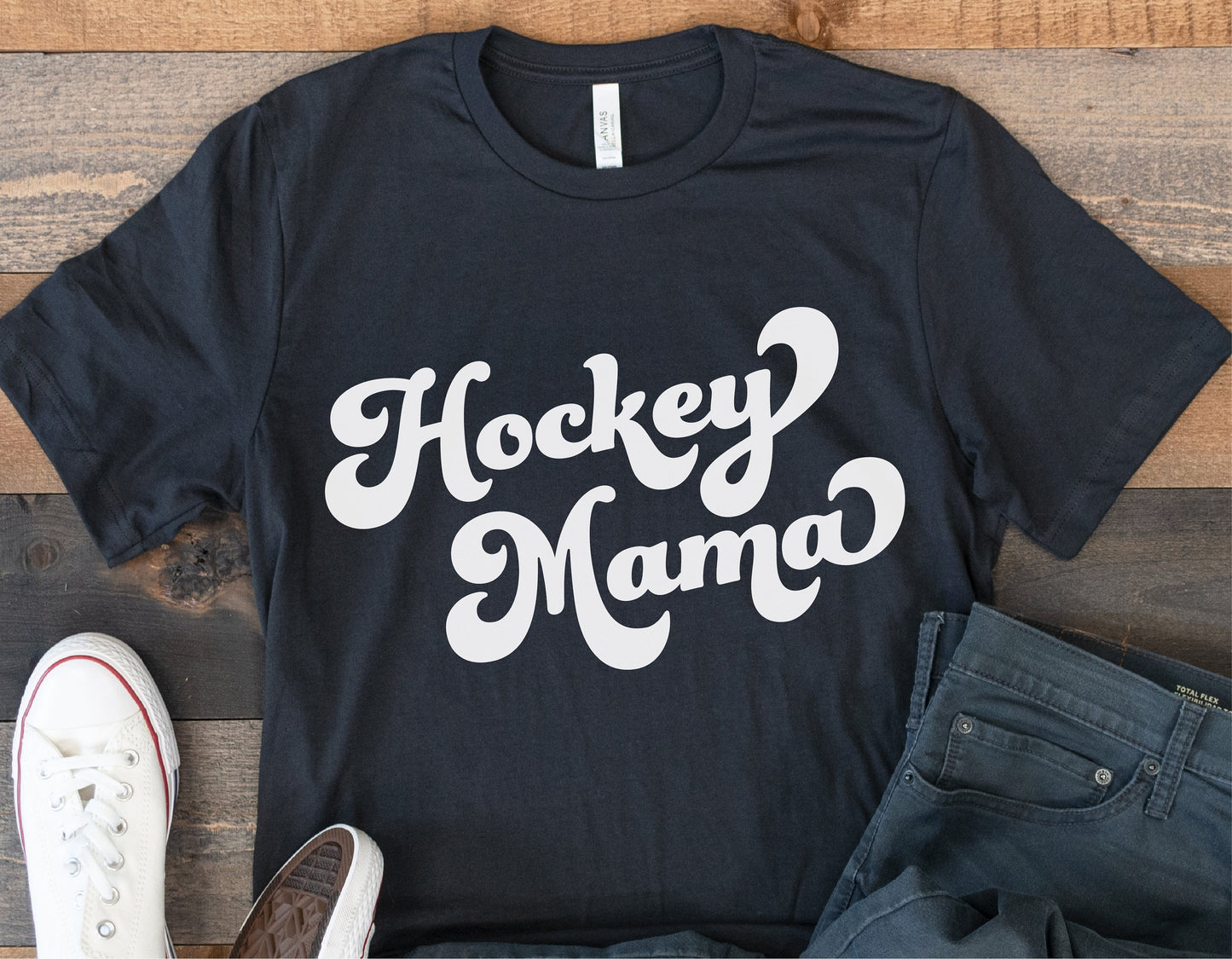 Black t-shirt with white 'Hockey Mama' design, ideal for hockey moms and fans, perfect for Cricut and Silhouette projects.