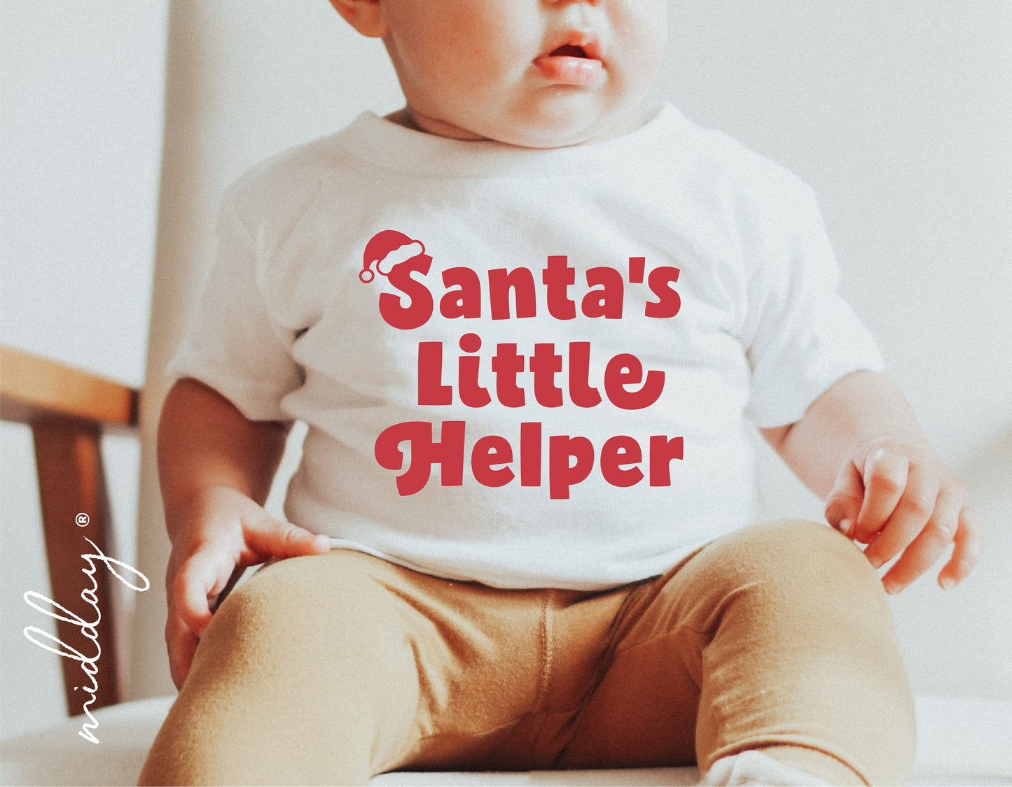 Baby wearing Santa's Little Helper shirt, perfect for Infant Christmas decor, Kids Christmas, and Cricut crafting projects.
