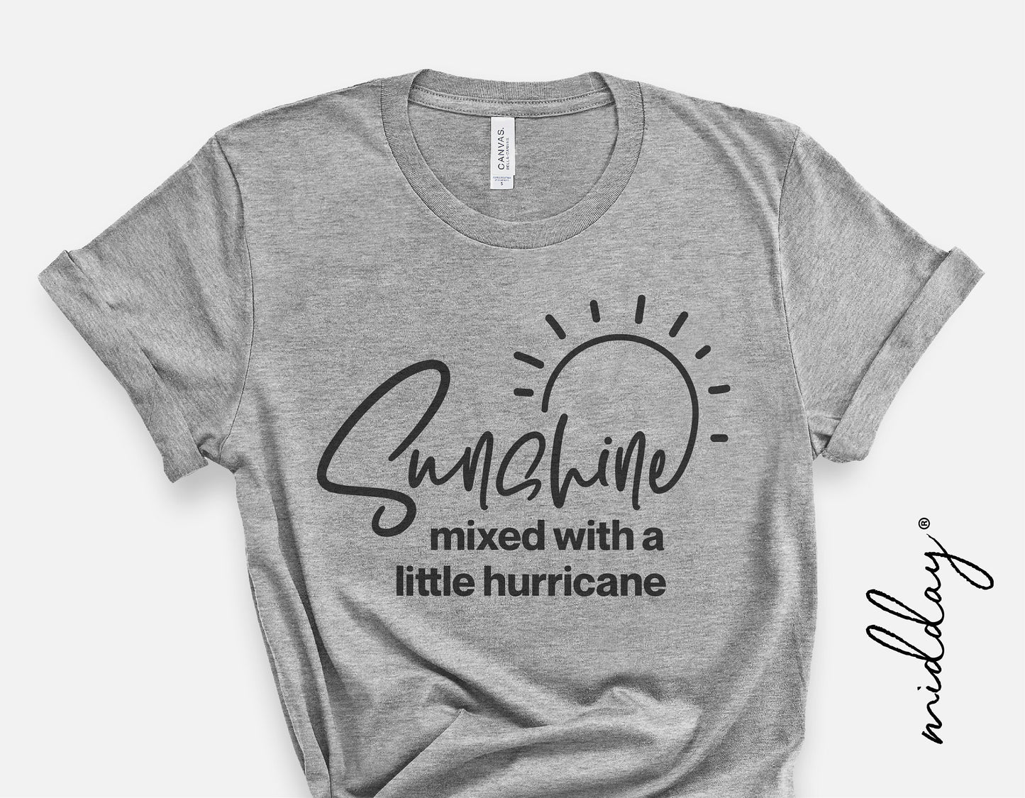 Gray t-shirt featuring 'Sunshine Mixed With A Little Hurricane' text design, ideal for Cricut and Silhouette projects. Perfect for sarcastic humor lovers.