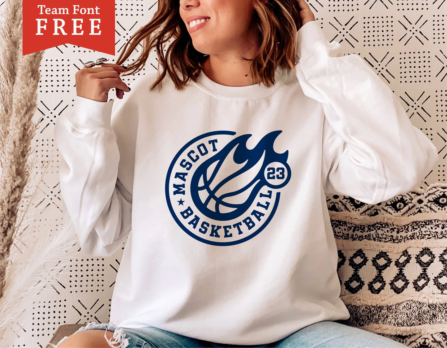 Woman wearing a white sweatshirt with a basketball logo design, promoting a basketball mom shirt for Cricut and sublimation projects.