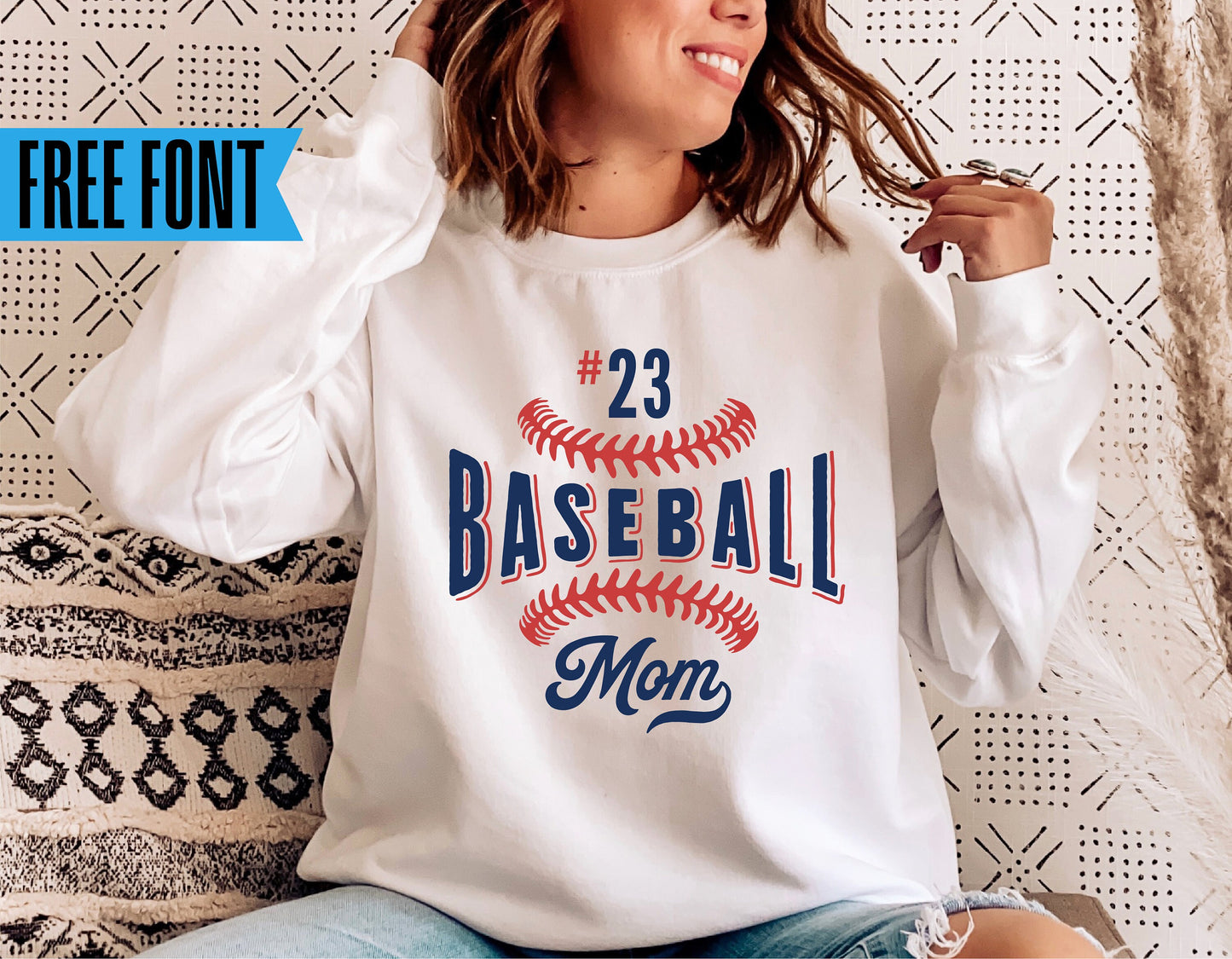 Woman wearing a white sweatshirt with 'Baseball Mom' design. Free font offer.