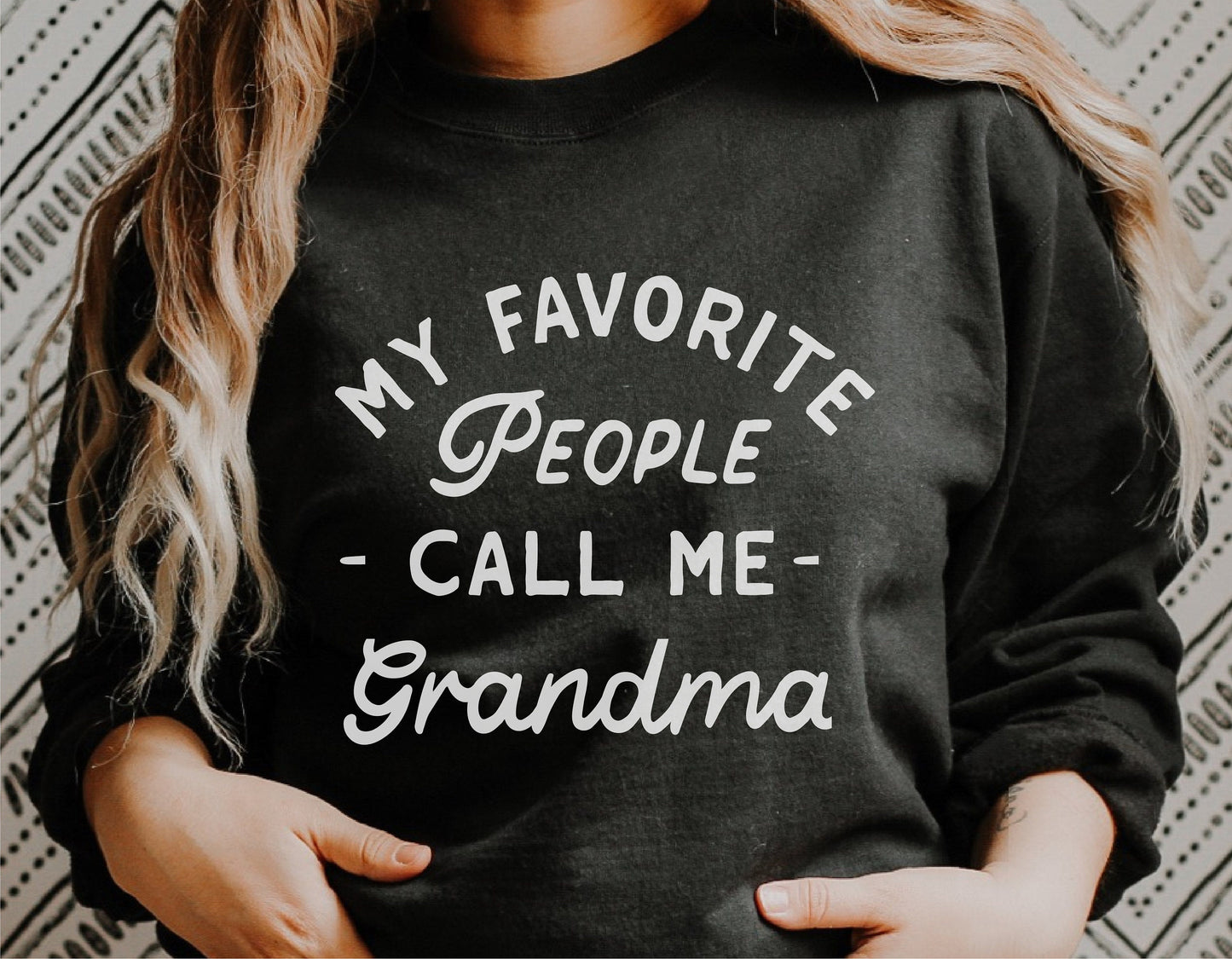 Black sweatshirt with 'My Favorite People Call Me Grandma' text, perfect for Mother's Day gift or crafting with Cricut and Silhouette.