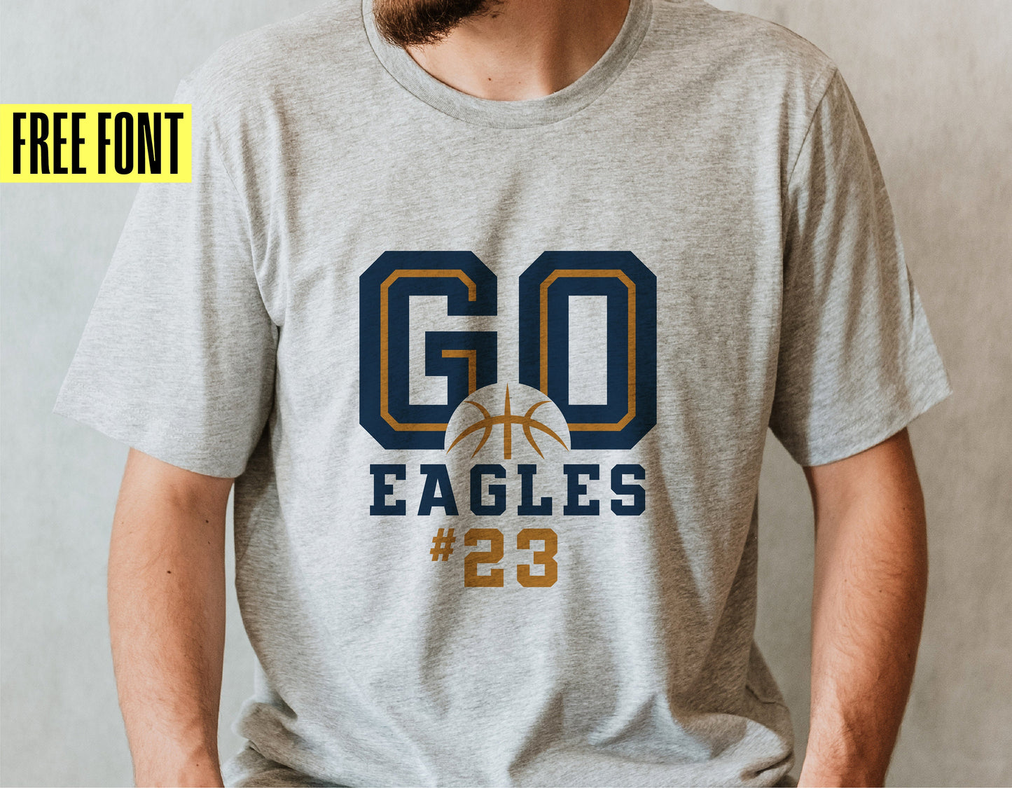 Gray t-shirt with 'GO EAGLES #23' basketball design and free font offer.