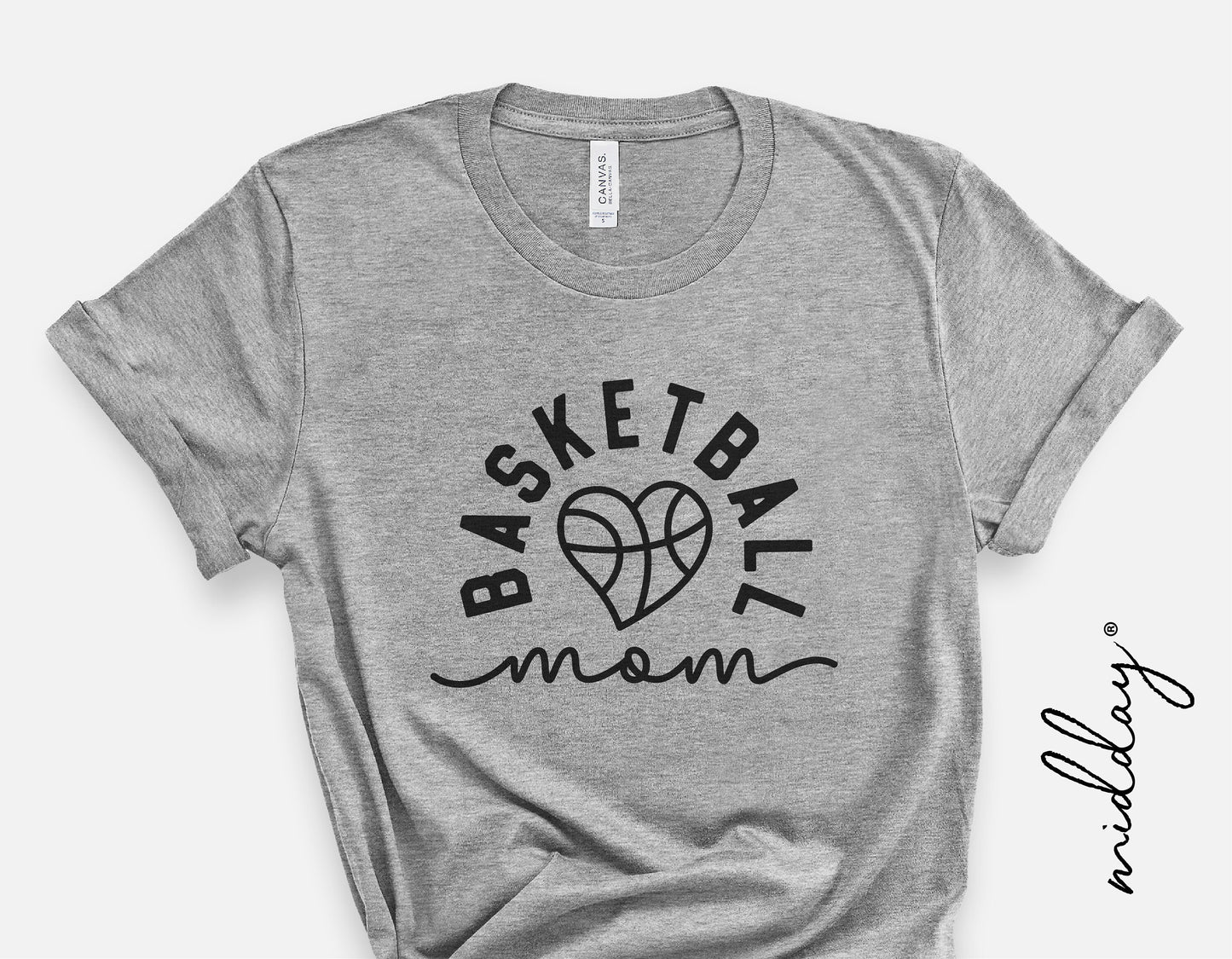 Gray t-shirt with 'Basketball Mom' text and heart-shaped basketball graphic, ideal for sports moms.