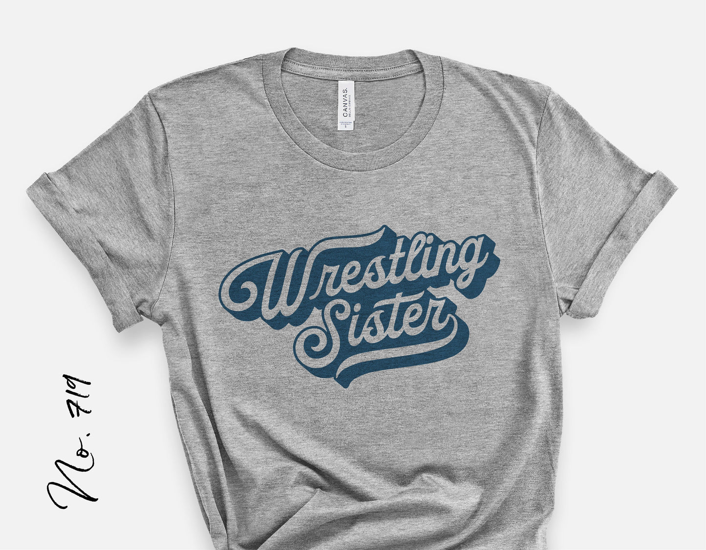 Gray t-shirt with 'Wrestling Sister' design in blue script font, perfect for wrestling enthusiasts and team supporters.