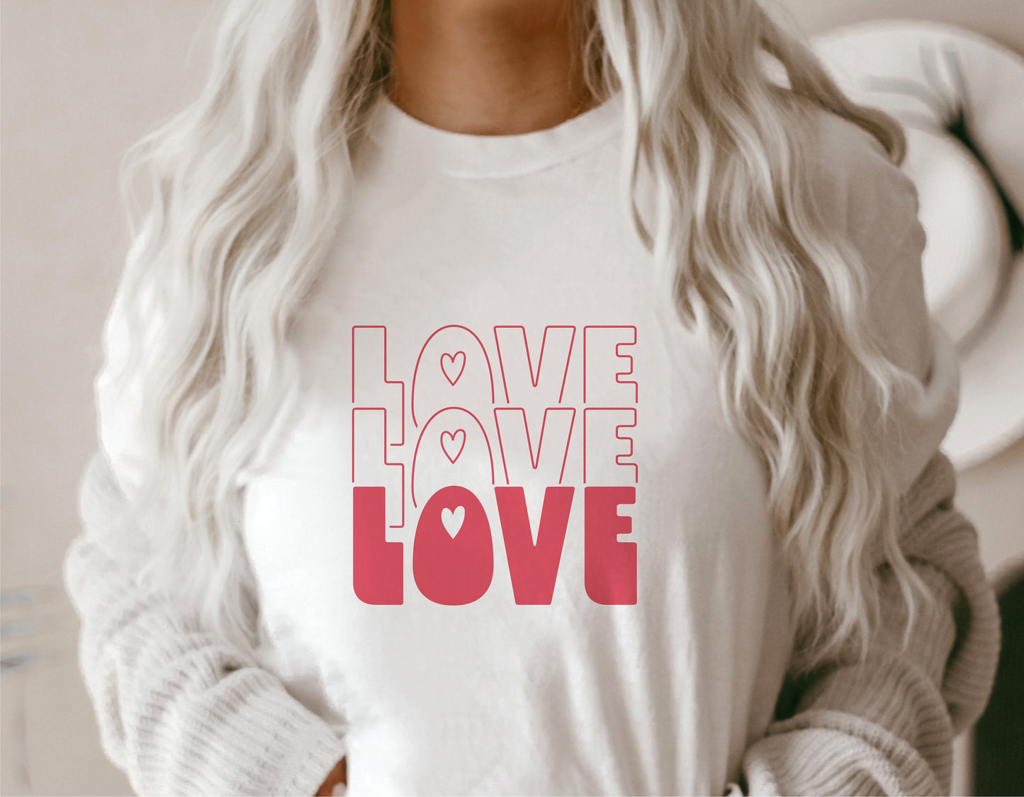 White t-shirt with pink 'Love Love Love' design, perfect for Valentine's Day or teacher gifts. Ideal for Cricut and Silhouette projects.