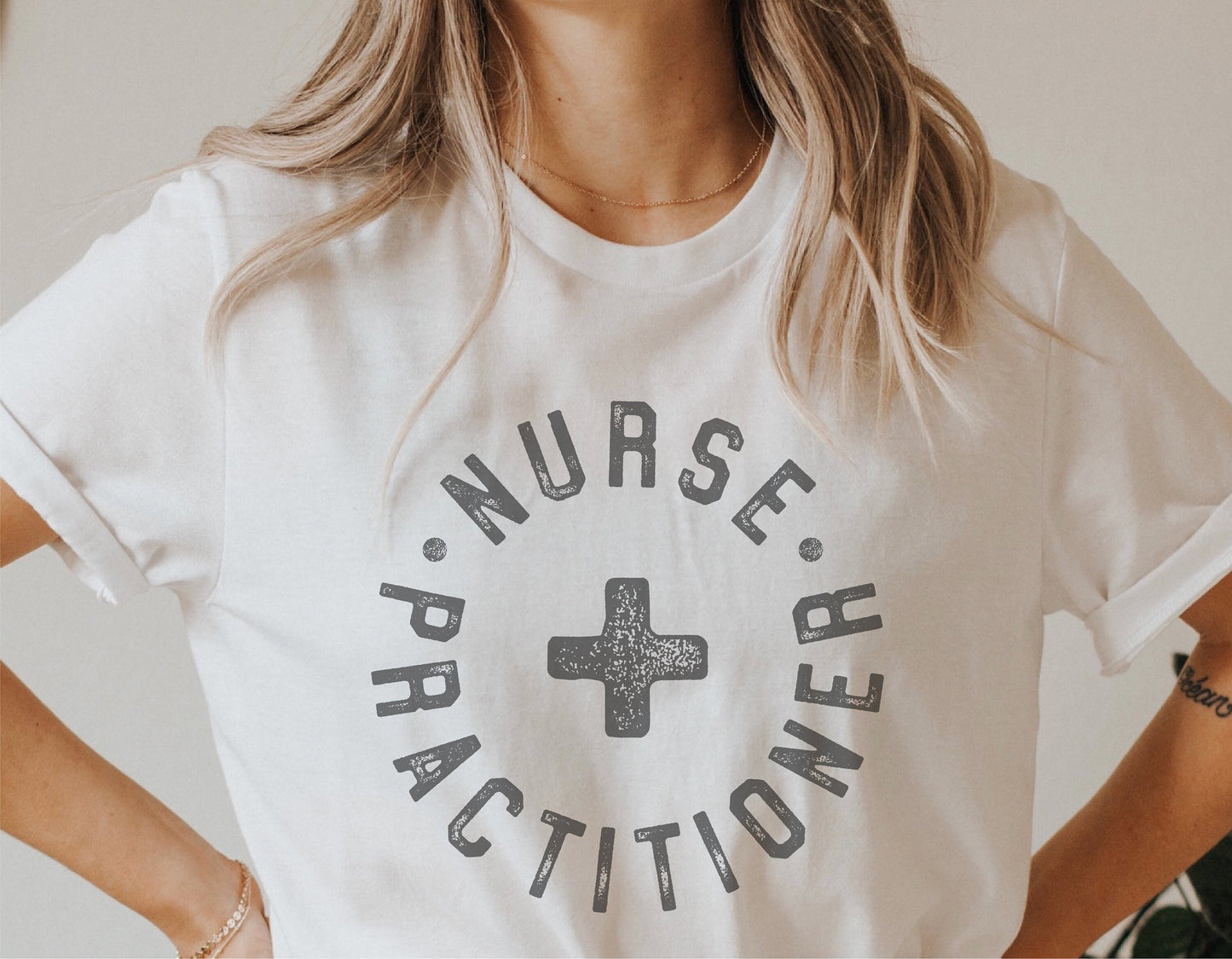 Woman wearing a white t-shirt with 'Nurse Practitioner' text and cross symbol, ideal for mugs, shirts, stickers, and Cricut projects.