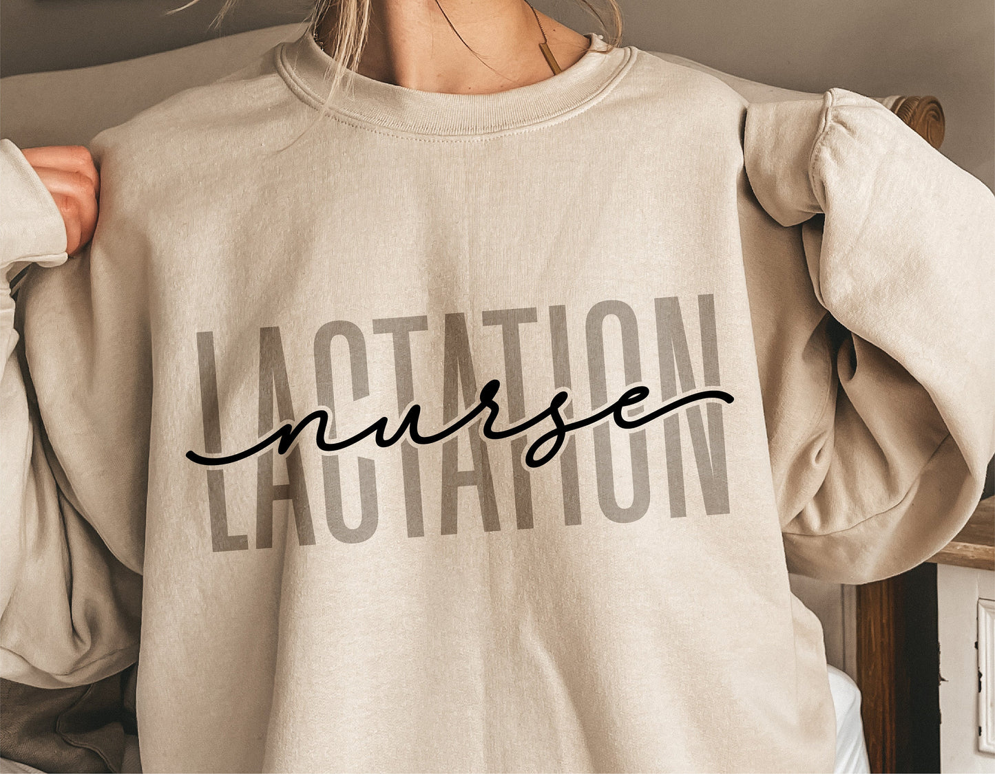Sweatshirt with 'Lactation Nurse' text design, ideal for breastfeeding support professionals.