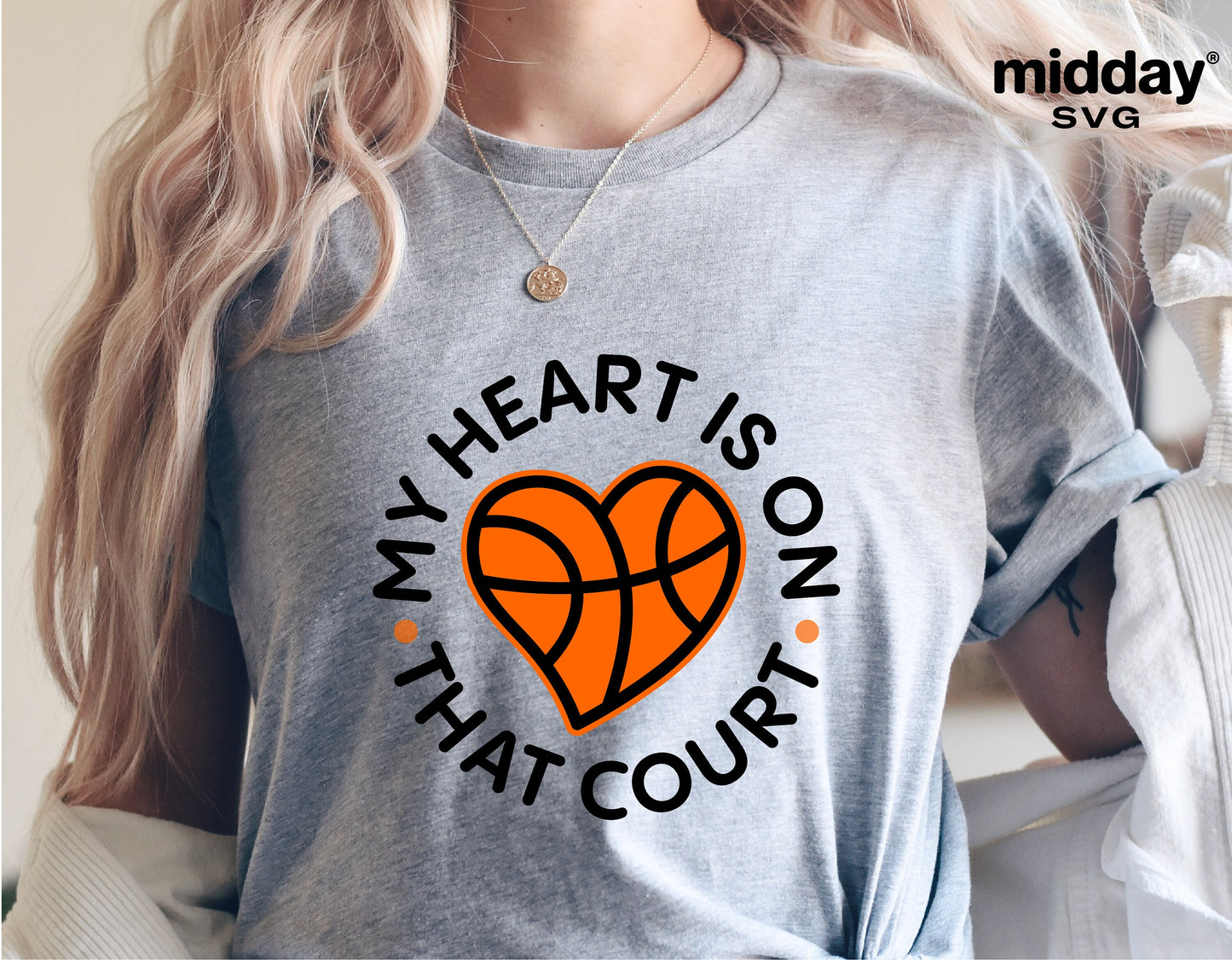 Woman wearing a grey t-shirt with 'My Heart is on That Court' basketball design for SVG files, perfect for Cricut and Silhouette projects.