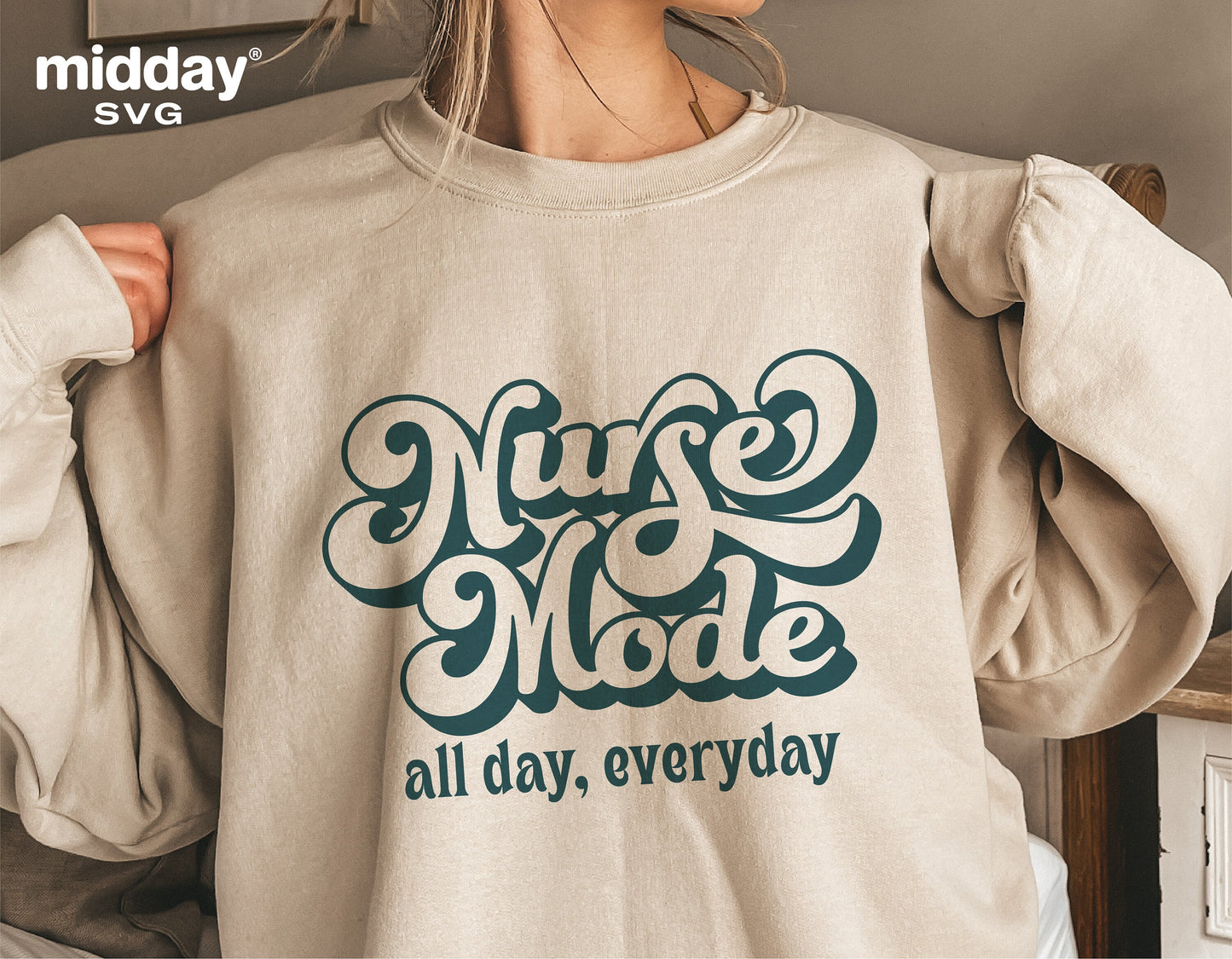 Sweatshirt featuring 'Nurse Mode All Day, Everyday' design for medical professionals, ideal for Cricut and Silhouette projects.
