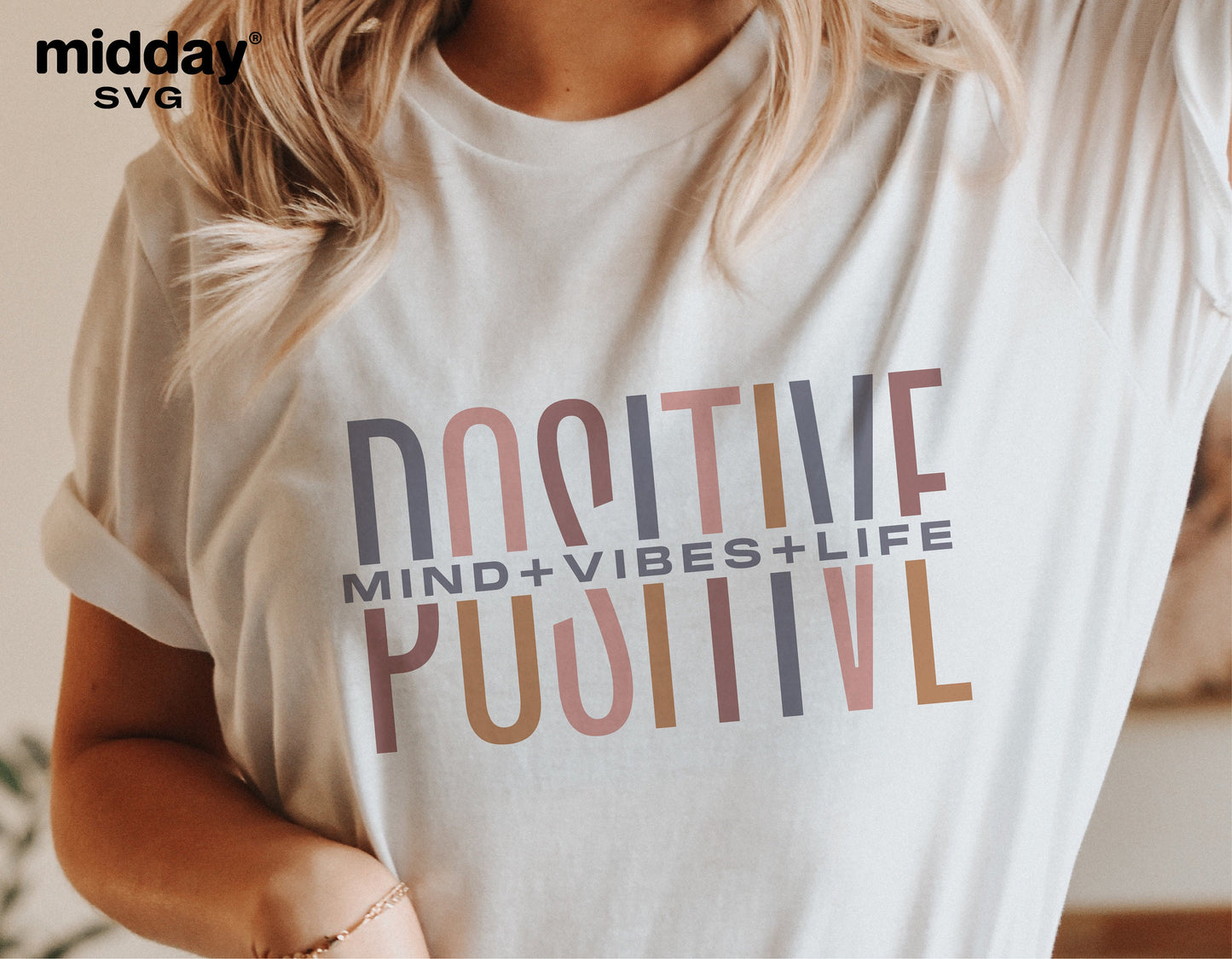Woman wearing a t-shirt with 'Positive Mind, Vibes, Life' text design, inspirational minimalist SVG perfect for Cricut and Silhouette.