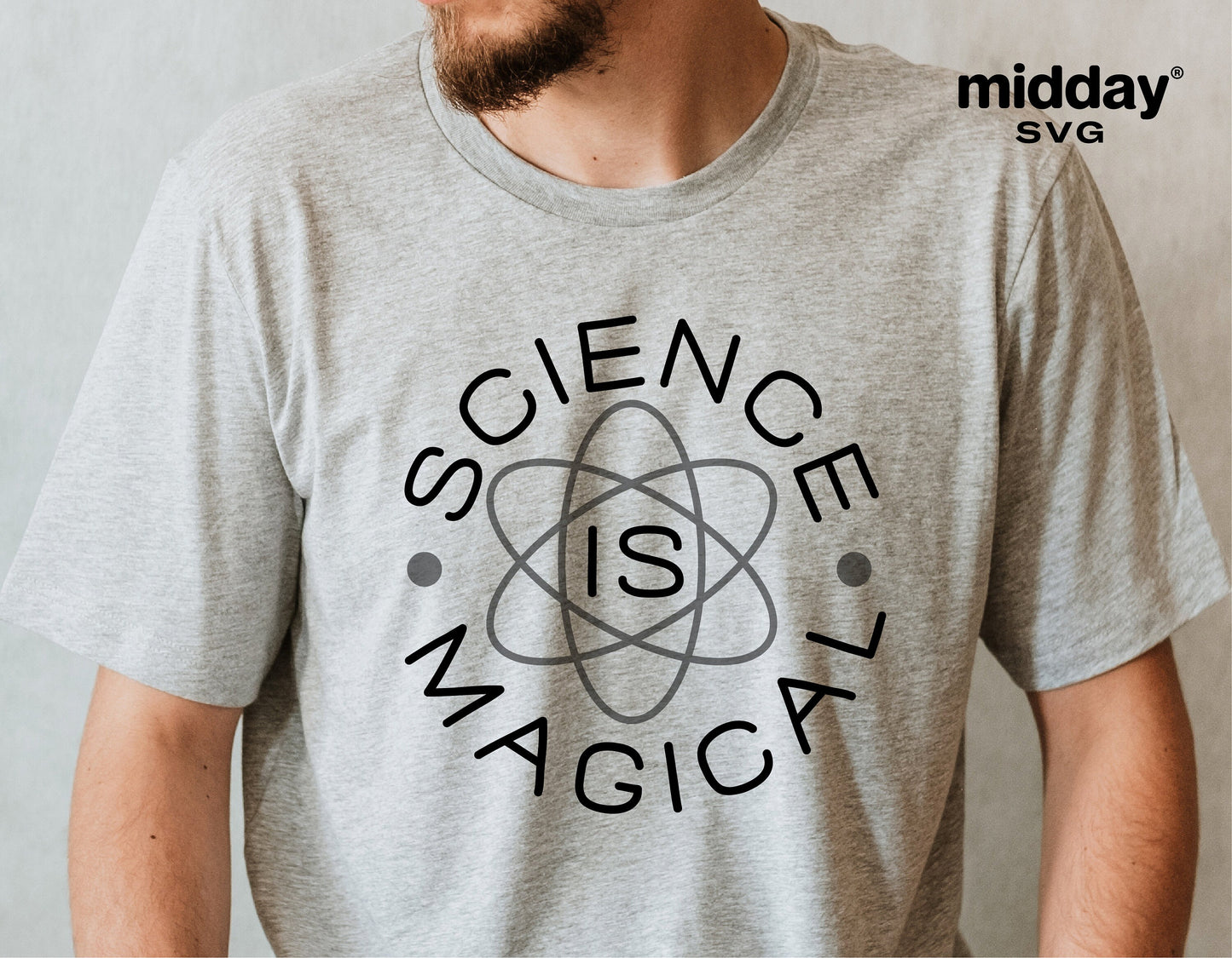 Person wearing a gray t-shirt with 'Science is Magical' SVG design for teachers, perfect for Cricut and Silhouette cutting projects.