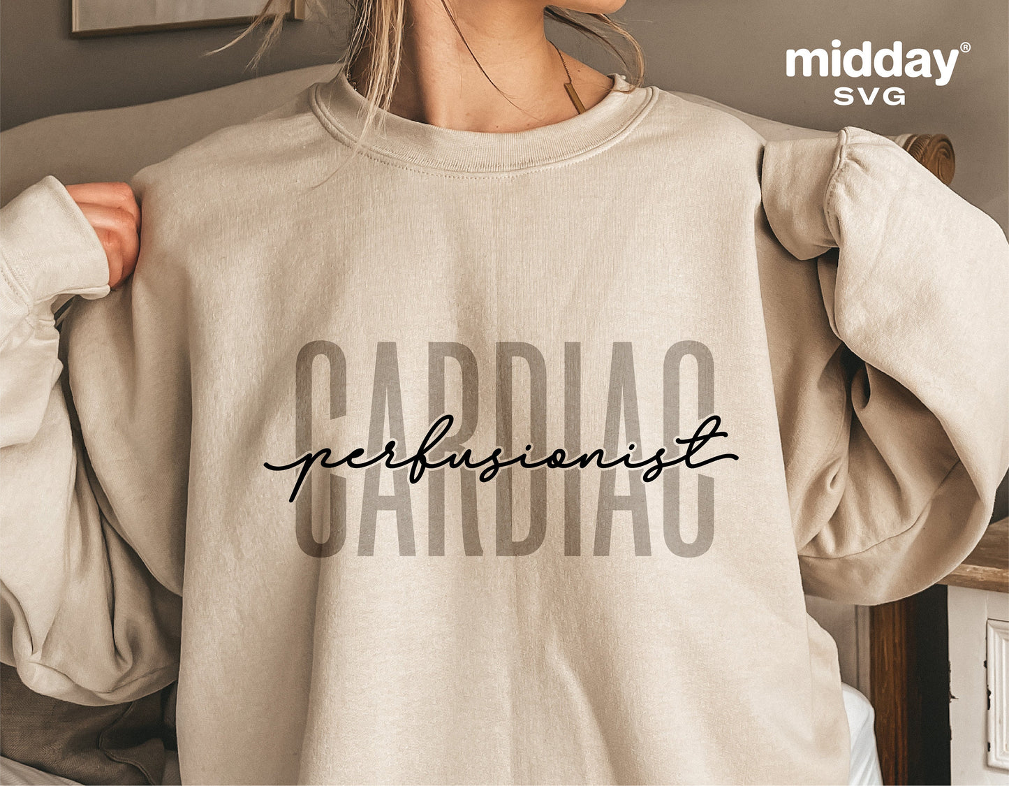 Person wearing a beige sweatshirt with 'Cardiac Perfusionist' text design, suitable for medical professionals and Cricut projects.