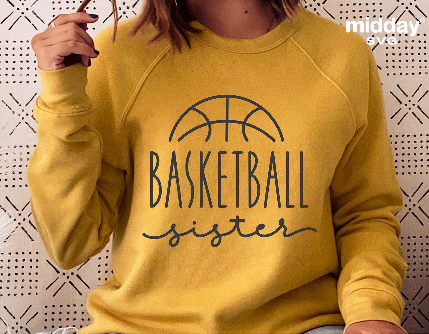 Yellow sweatshirt featuring a 'Basketball Sister' design, perfect for Cricut and Silhouette projects. Ideal for basketball fans.