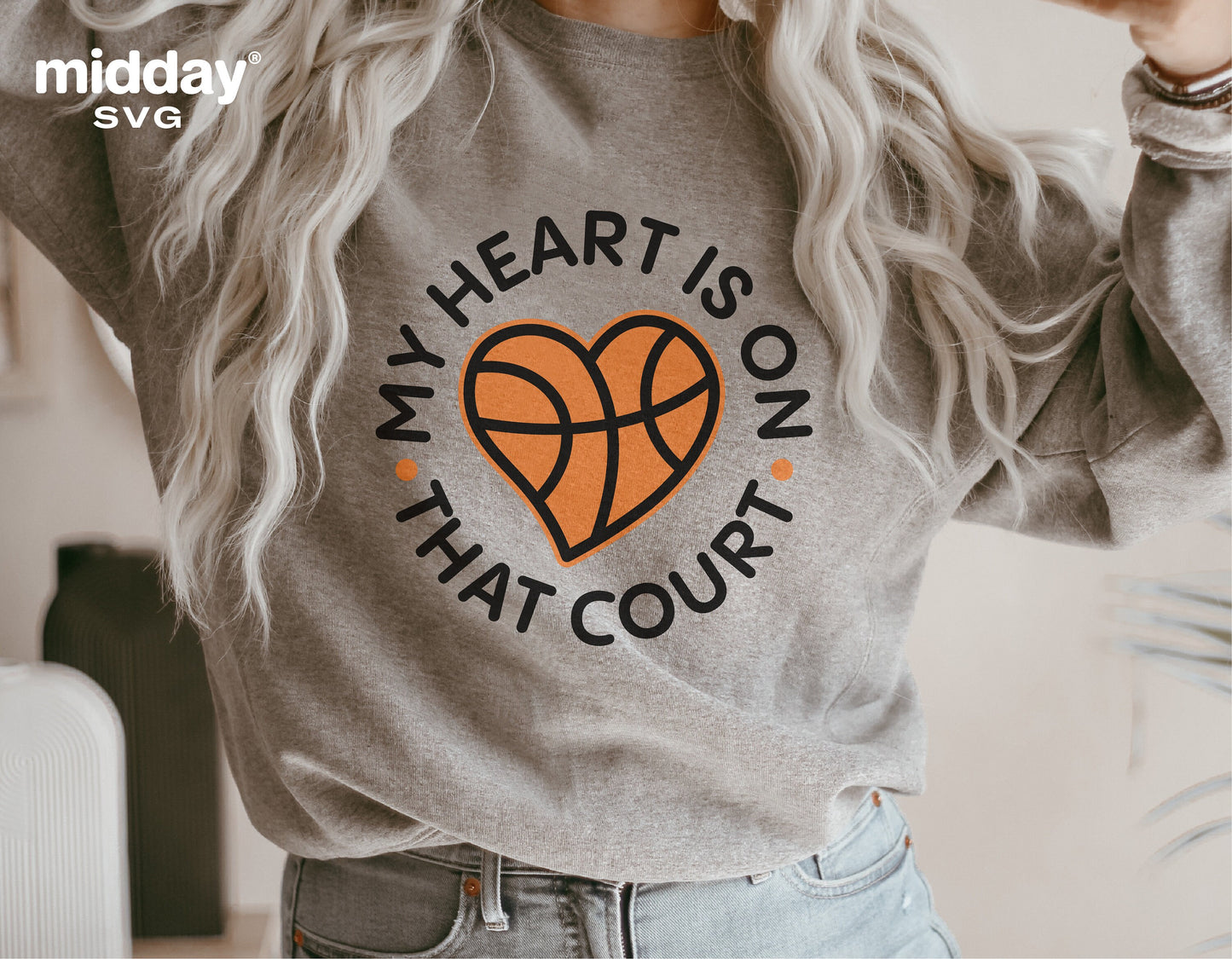 Person wearing a grey sweatshirt with 'My Heart is on That Court' basketball design, suitable for Cricut and Silhouette projects.