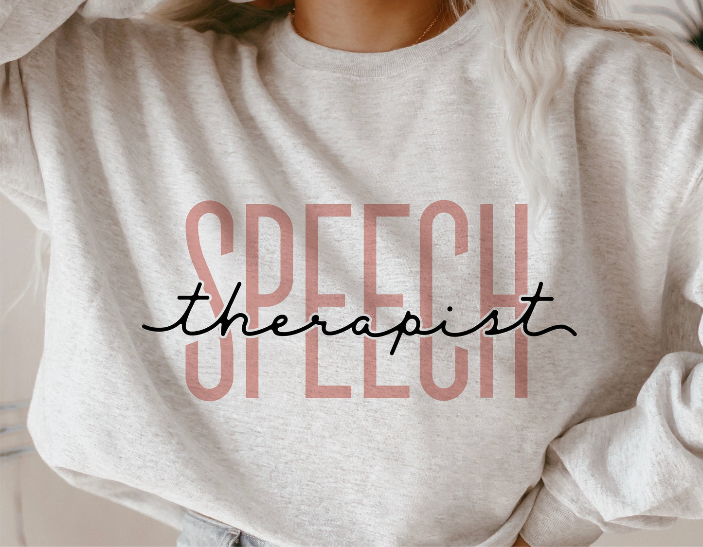 Sweatshirt with 'Speech Therapist' design, ideal for speech therapy professionals and Cricut projects, sublimation, and crafting.
