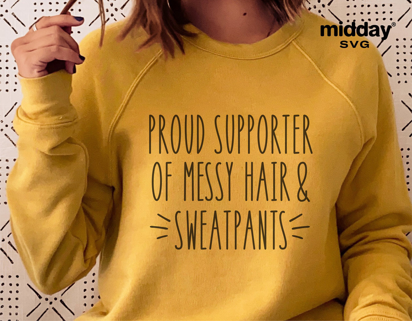 Yellow sweatshirt with 'Proud Supporter of Messy Hair & Sweatpants' text, humorously embracing casual style.