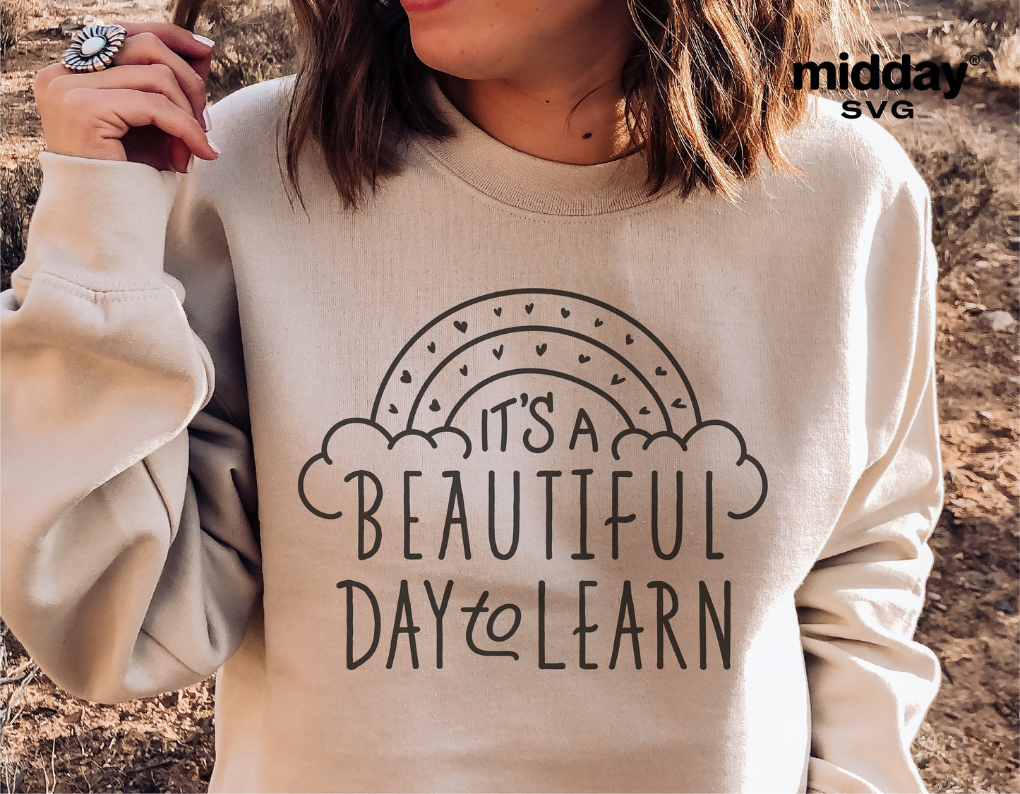 Woman wearing 'It's A Beautiful Day To Learn' teacher shirt SVG design