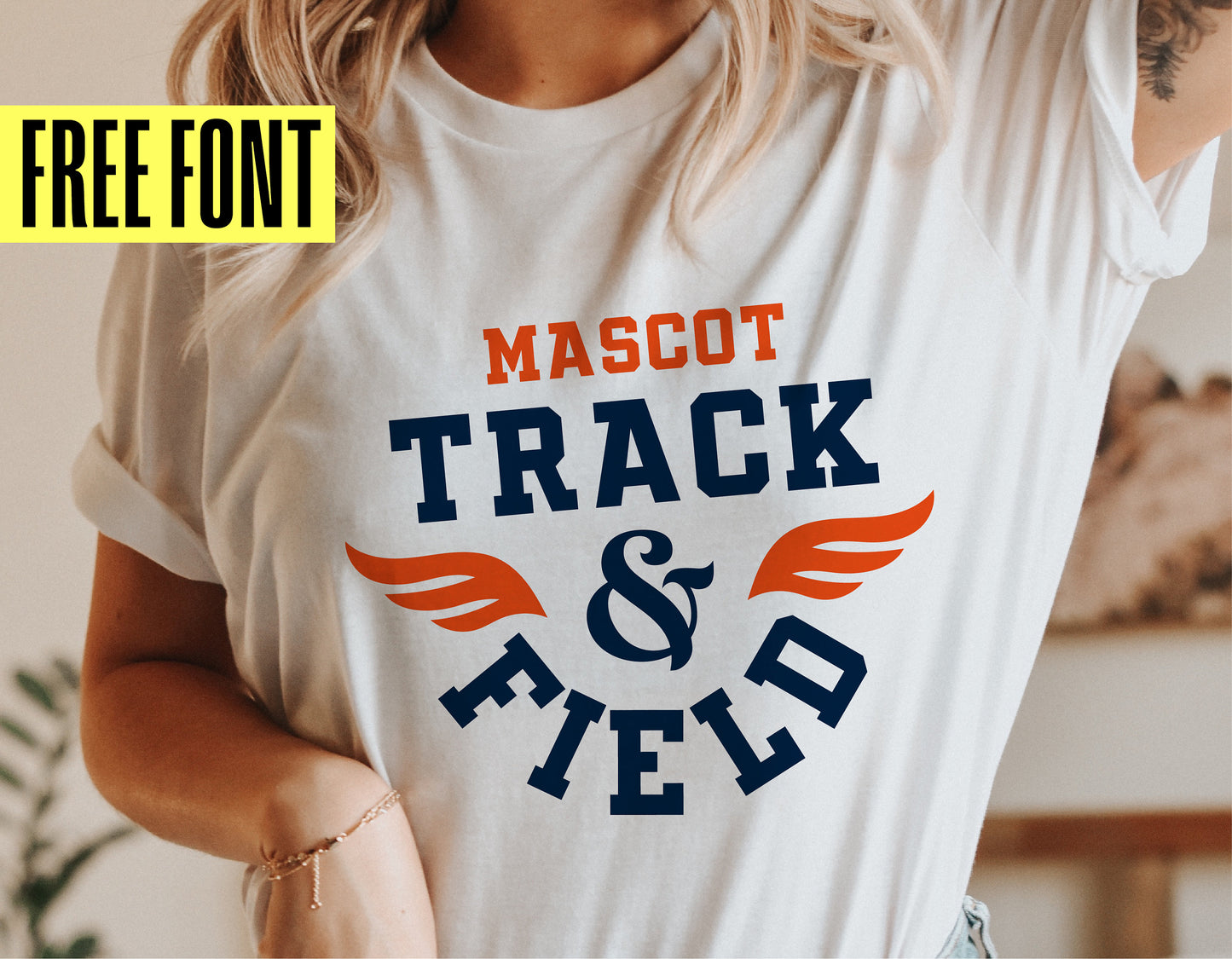 Woman wearing white shirt with 'Mascot Track & Field' logo in orange and navy, featuring wing design, promoting free font.