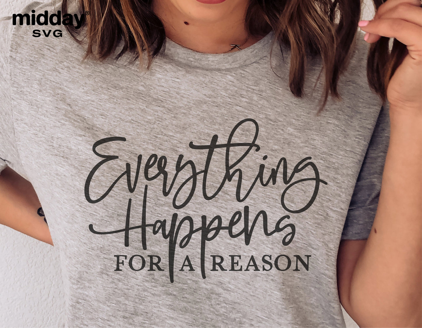 Close-up of a gray t-shirt with 'Everything Happens for a Reason' text, perfect for mental health awareness, crafted in a boho style.