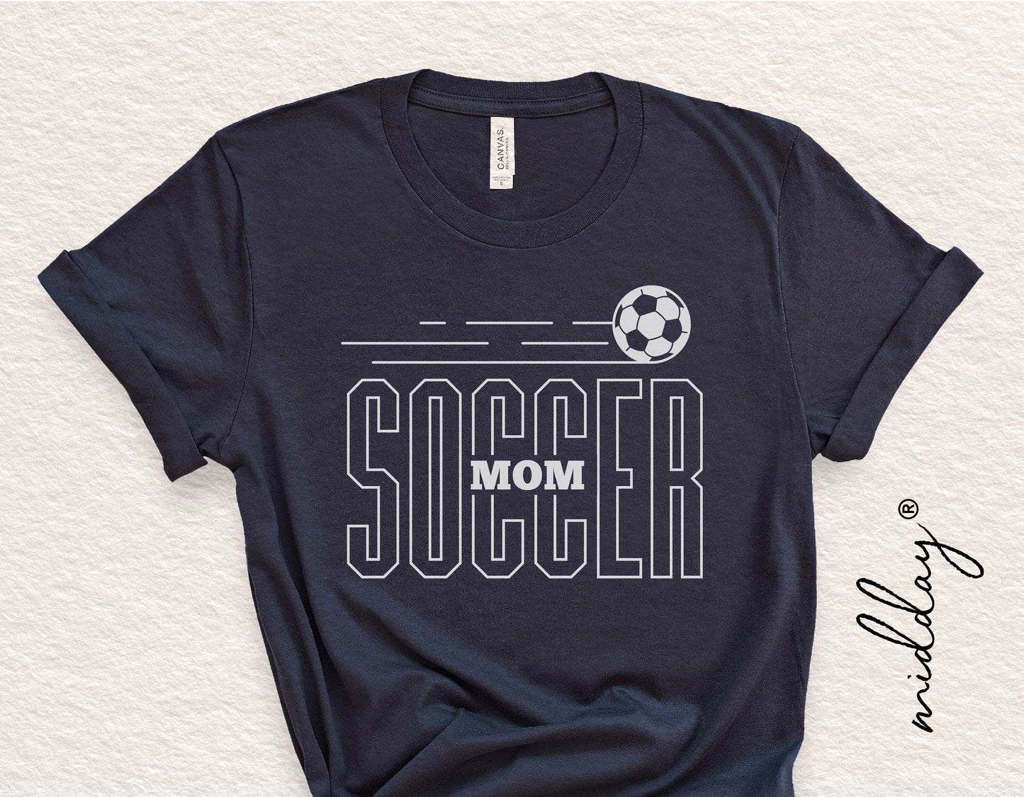 Navy blue soccer mom t-shirt with soccer ball graphic and bold text, ideal for Cricut and Silhouette projects.