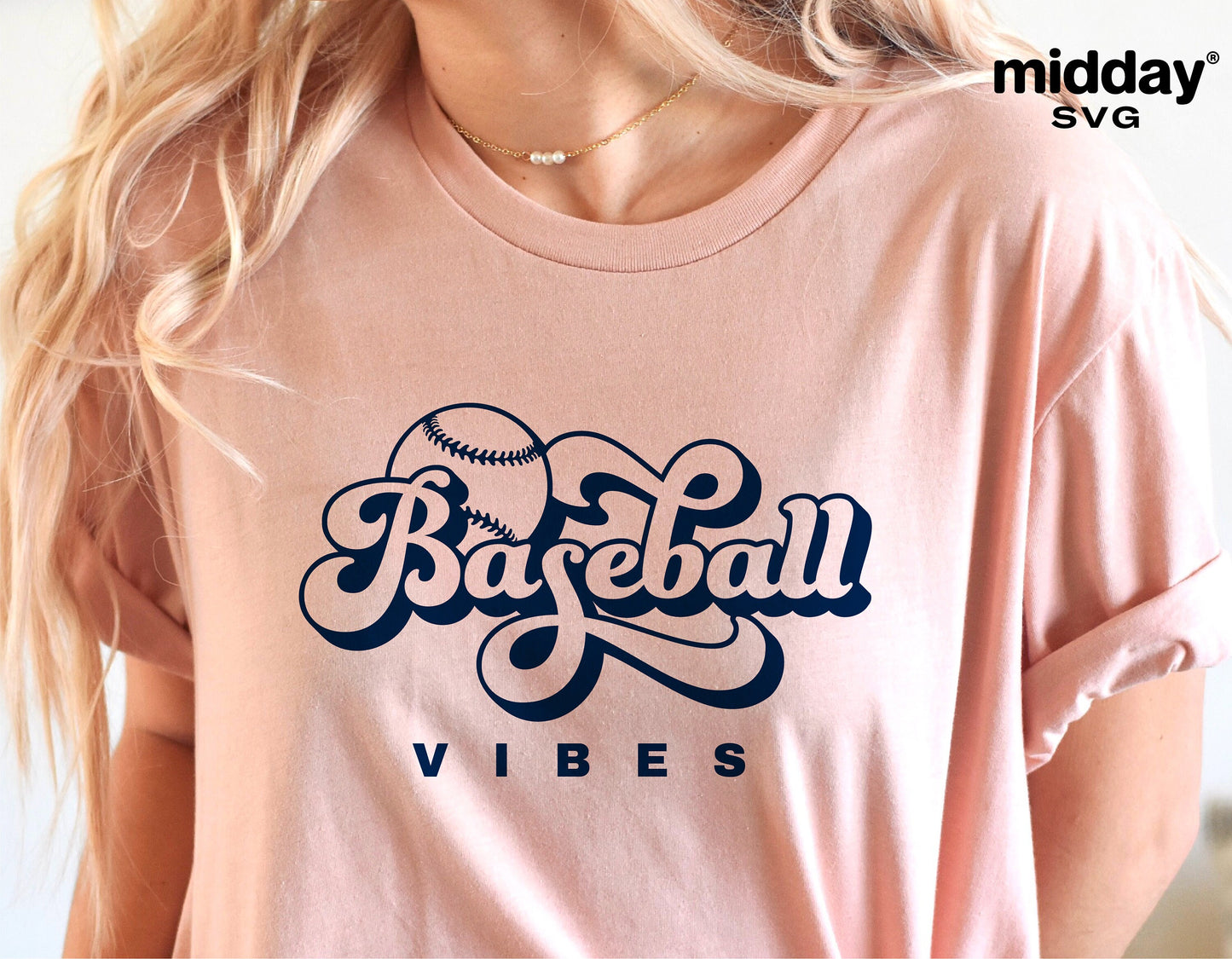 Person wearing pink shirt with 'Baseball Vibes' graphic, ideal for Cricut and sublimation projects.