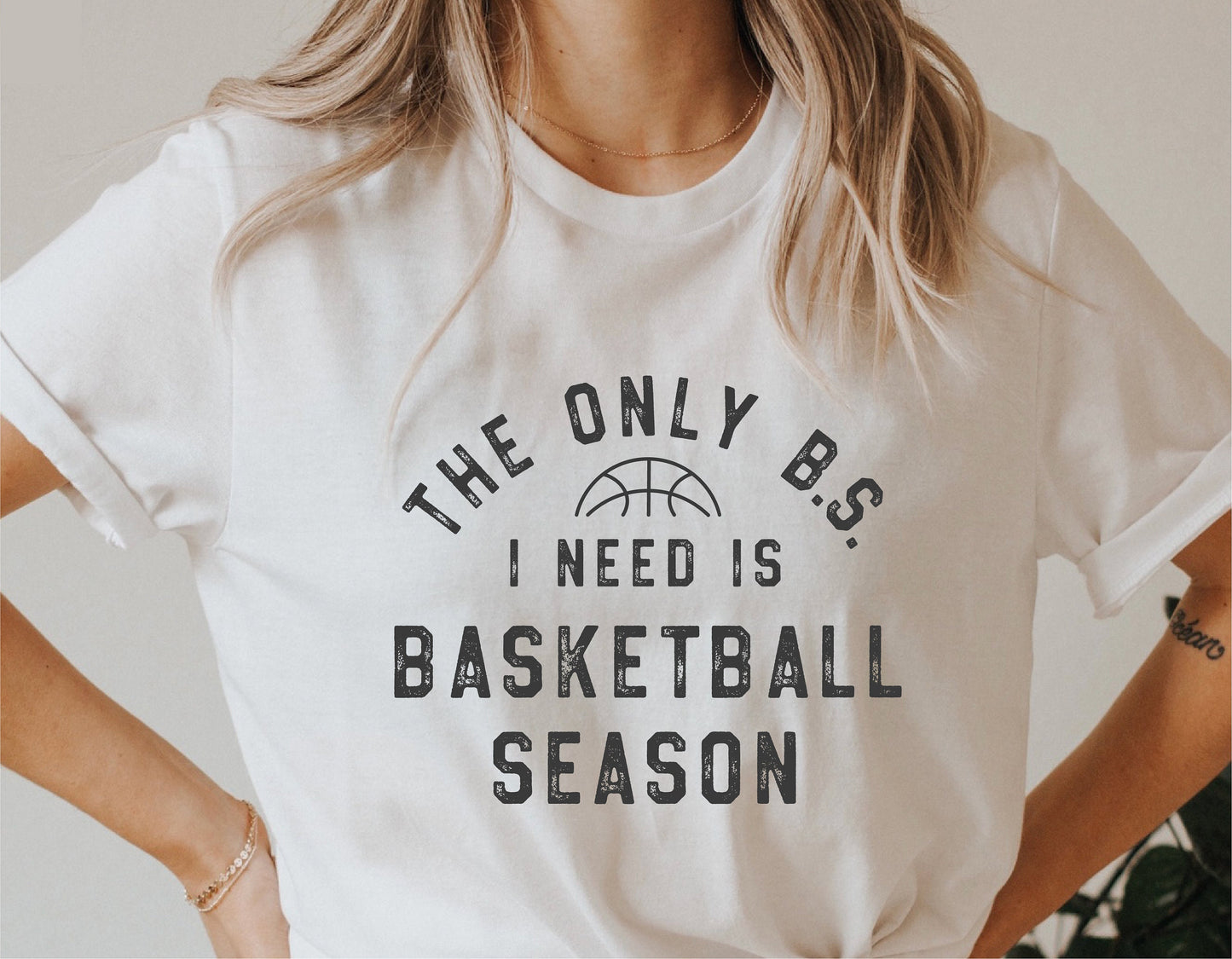 White t-shirt with 'The Only B.S. I Need Is Basketball Season' text design, ideal for basketball enthusiasts and Cricut cut projects.