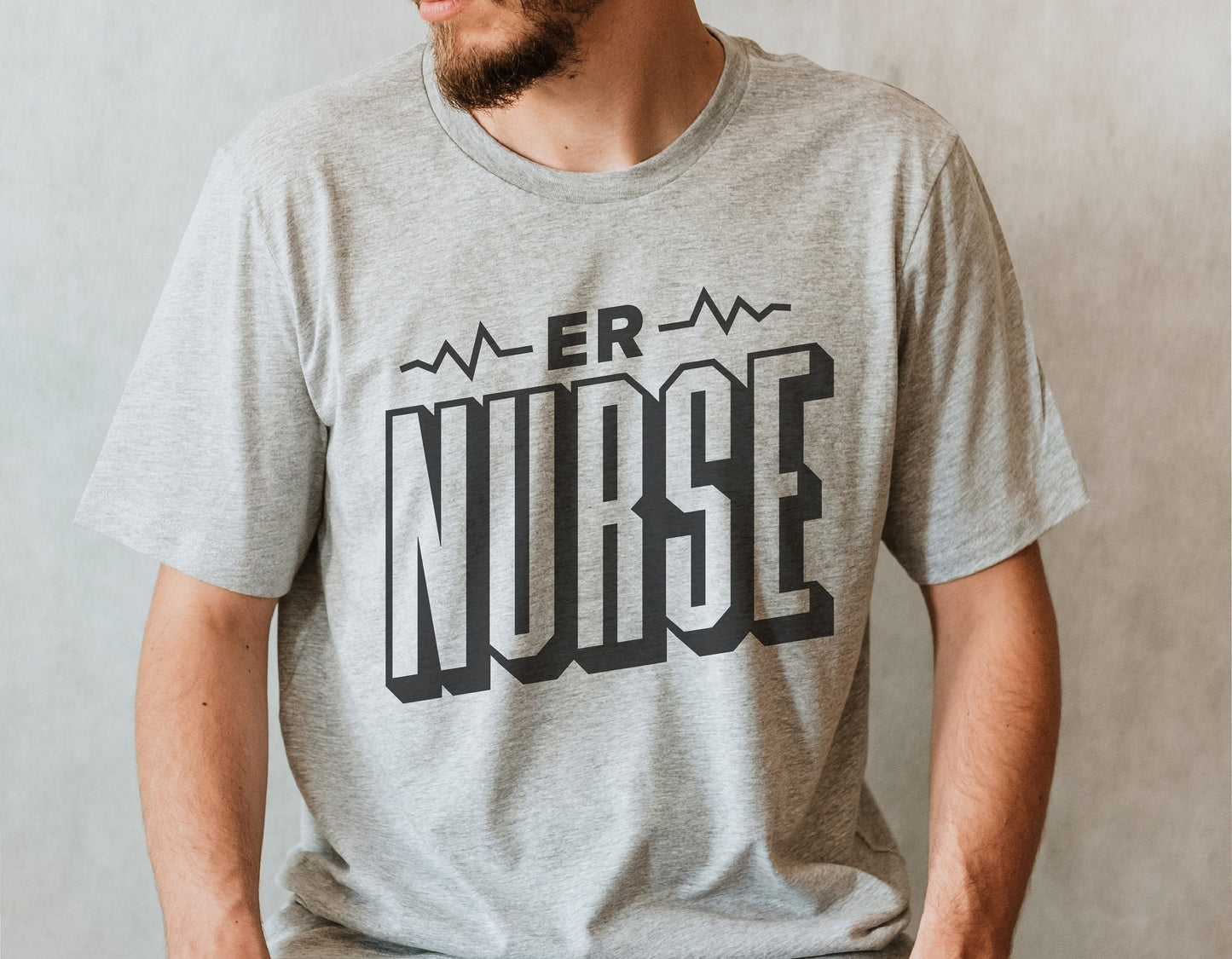 Person wearing a gray t-shirt with "ER Nurse" graphic design, suitable for Cricut or Silhouette crafting projects.