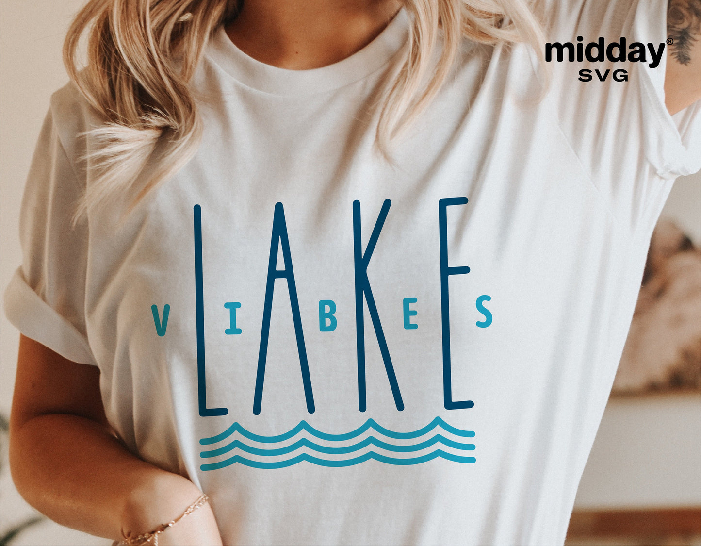 White t-shirt with blue "Lake Vibes" design; perfect for lake vacations and summer camping trips; ideal for Cricut and Silhouette projects.