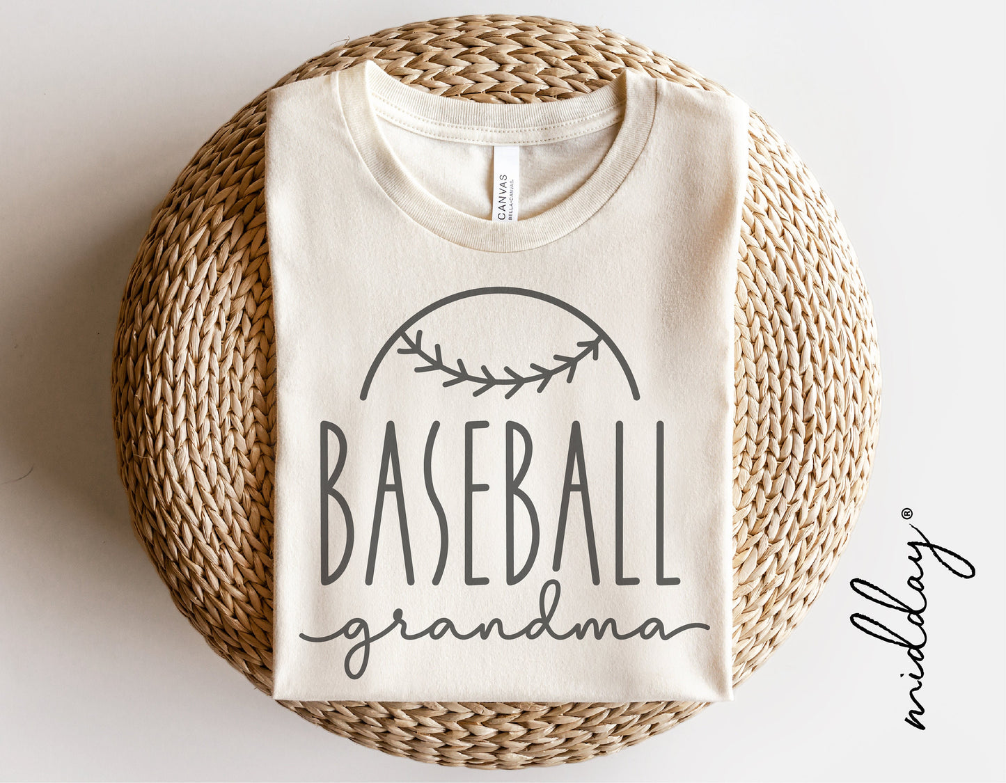 White t-shirt with 'Baseball Grandma' design, perfect for creating personalized shirts using Cricut or Silhouette, ideal for sports fans.