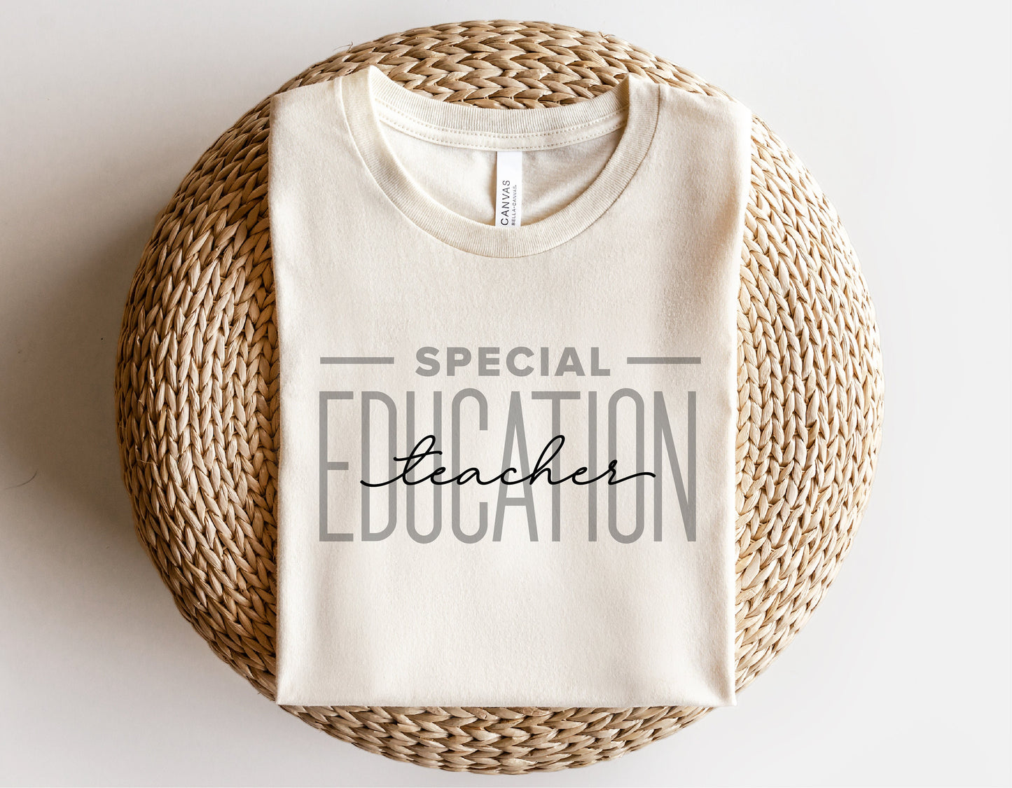 Special Education Teacher shirt with text design, folded on a woven surface, ideal for Cricut and Silhouette projects.