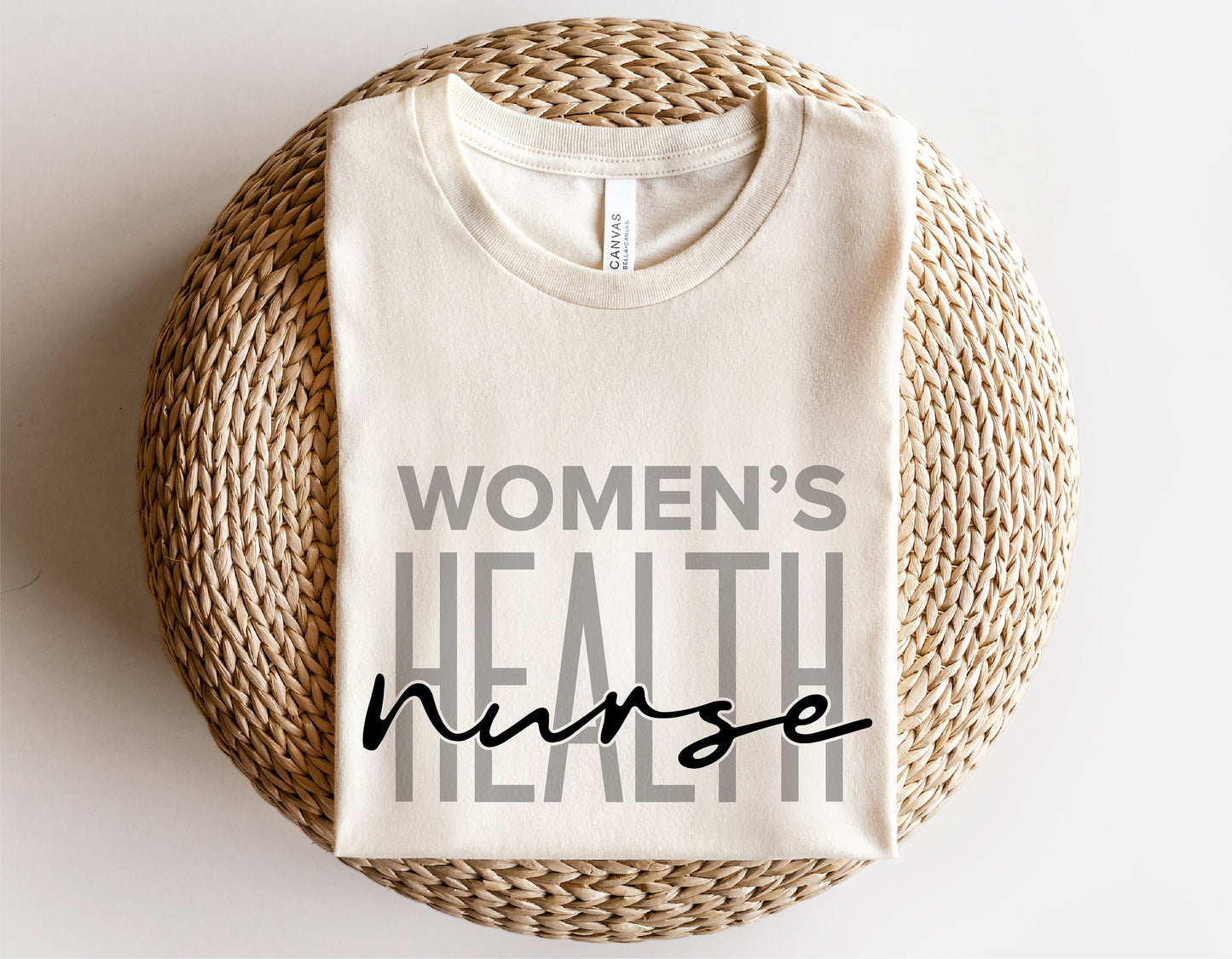 Women's Health Nurse shirt folded on a wicker basket, perfect for Cricut and Silhouette projects.