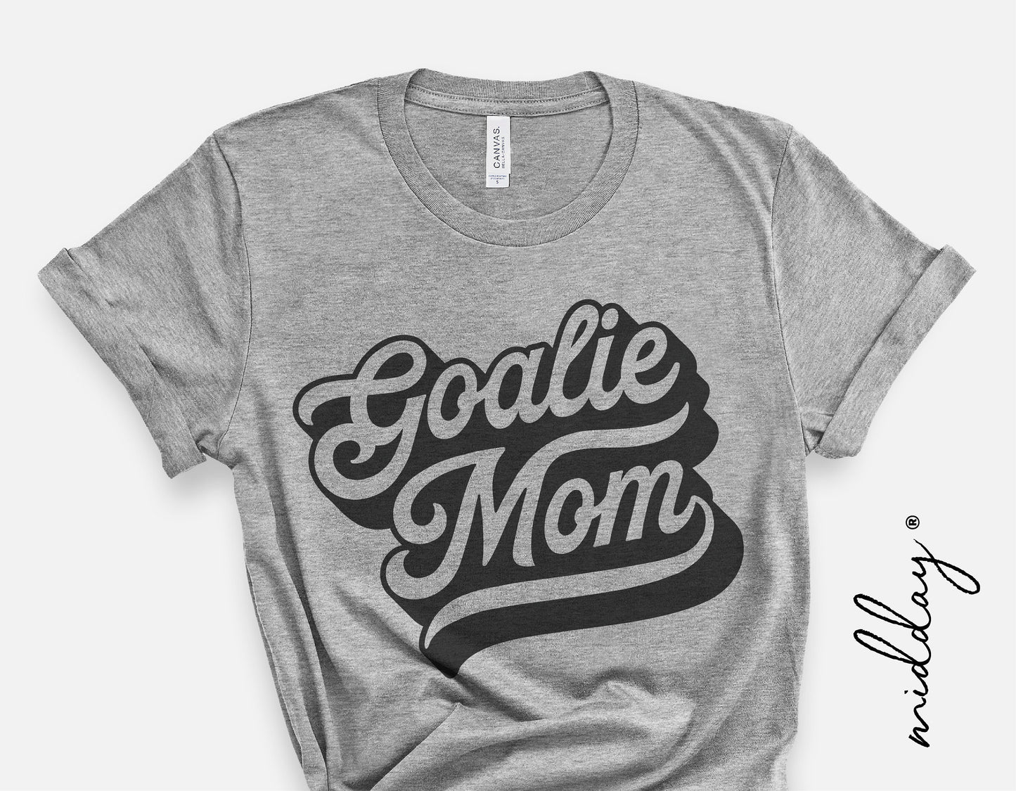 Gray t-shirt with 'Goalie Mom' text design, perfect for hockey moms, ideal for Cricut and Silhouette projects like shirts or tumblers.