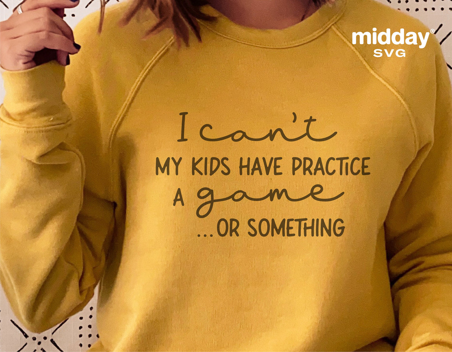 Yellow sweatshirt with 'I can't, my kids have practice a game...or something' text, ideal for sports moms.