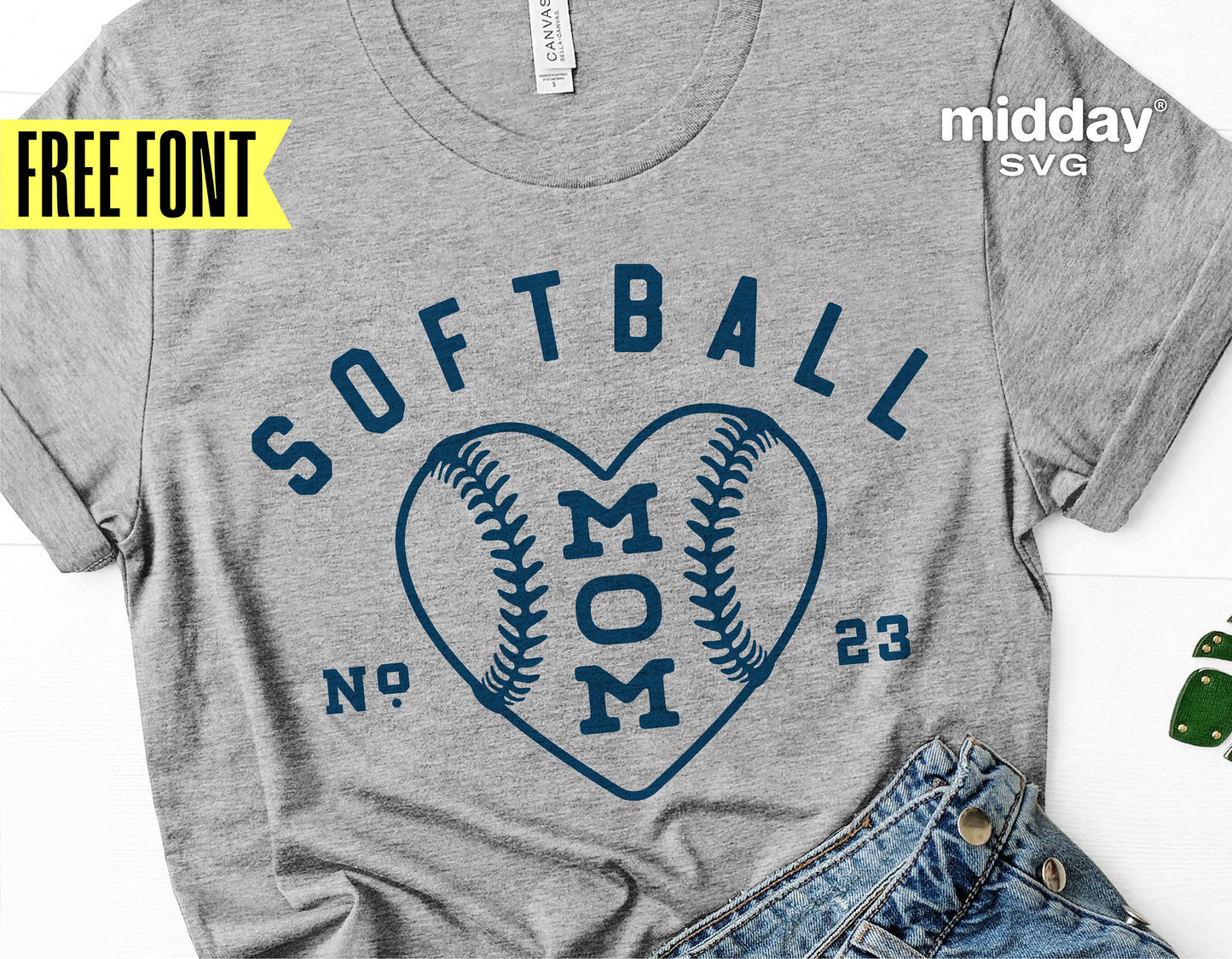 Gray t-shirt with 'Softball Mom' text and heart-shaped baseball design for Cricut, featuring free font by Midday SVG.