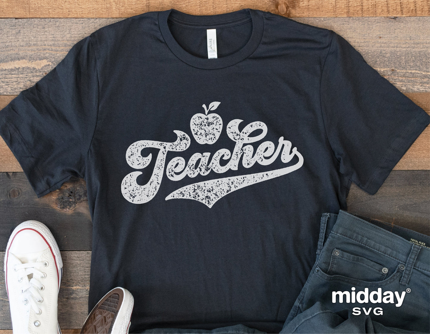 Black t-shirt with vintage-style 'Teacher' graphic featuring an apple, ideal for teacher appreciation gifts, Cricut, and Silhouette projects.