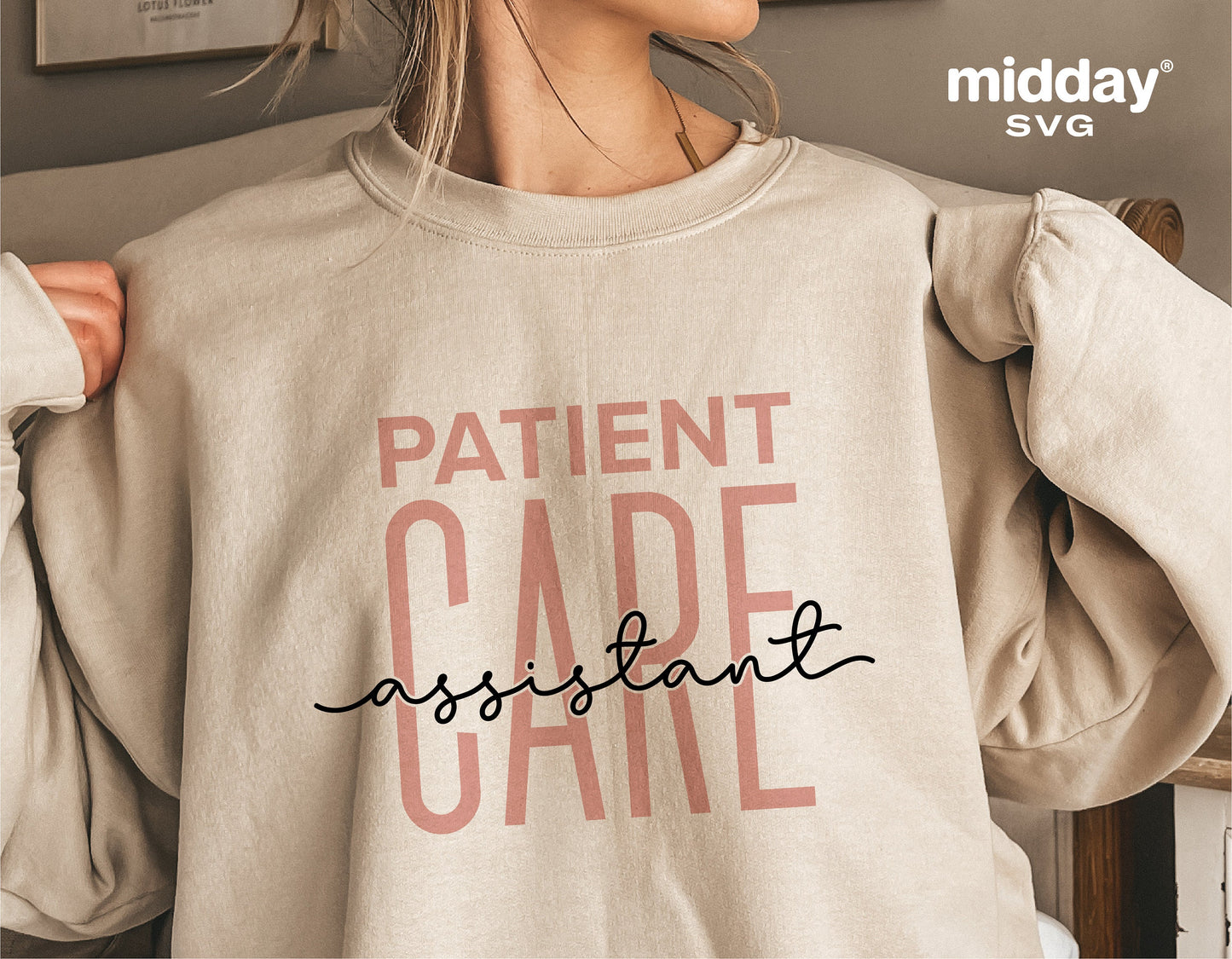 Patient Care Assistant shirt design featured on beige sweatshirt, suitable for Cricut and Silhouette cutting machines.