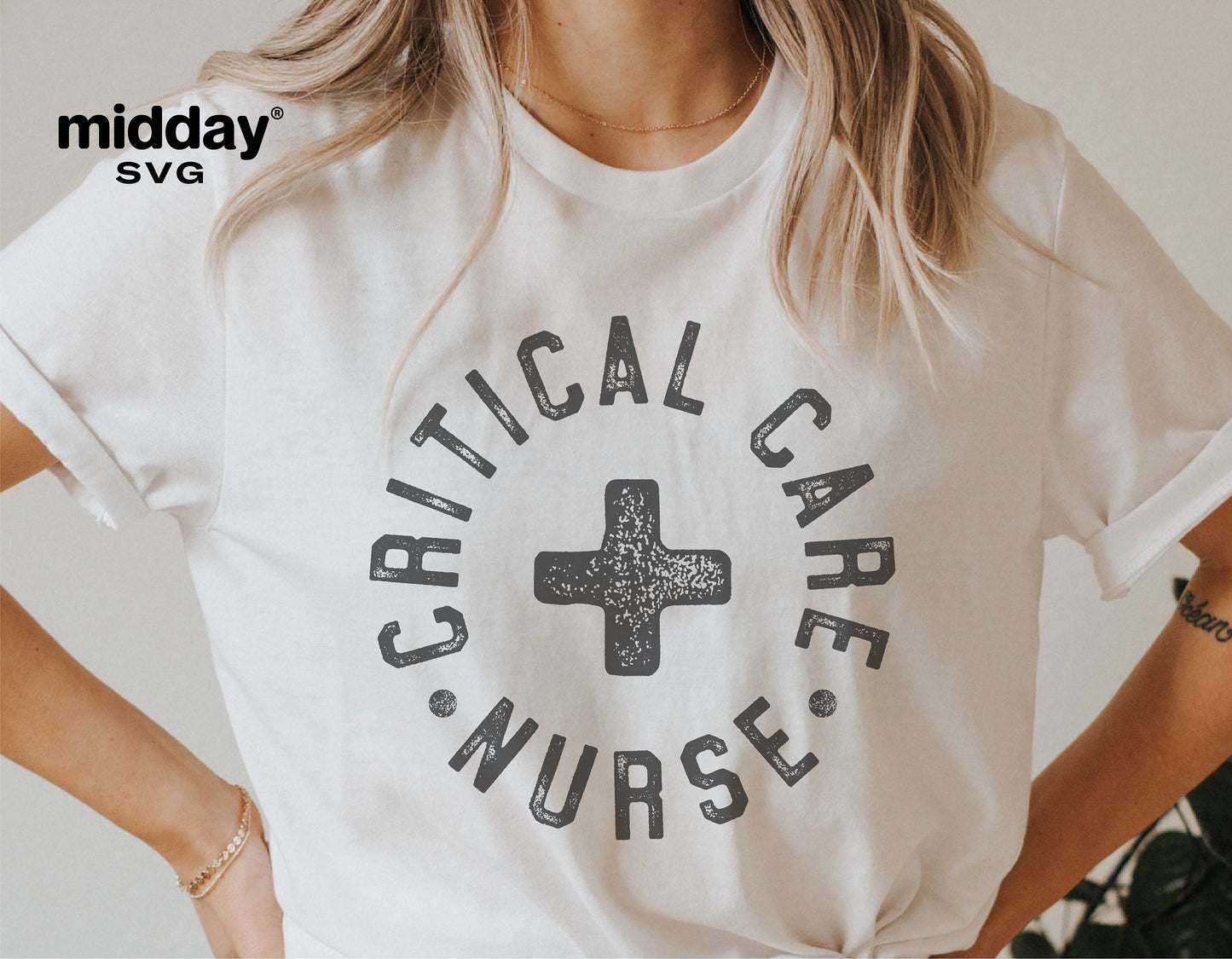 Critical Care Nurse t-shirt with bold text and medical cross design, ideal for badge reel and Cricut cutting projects.