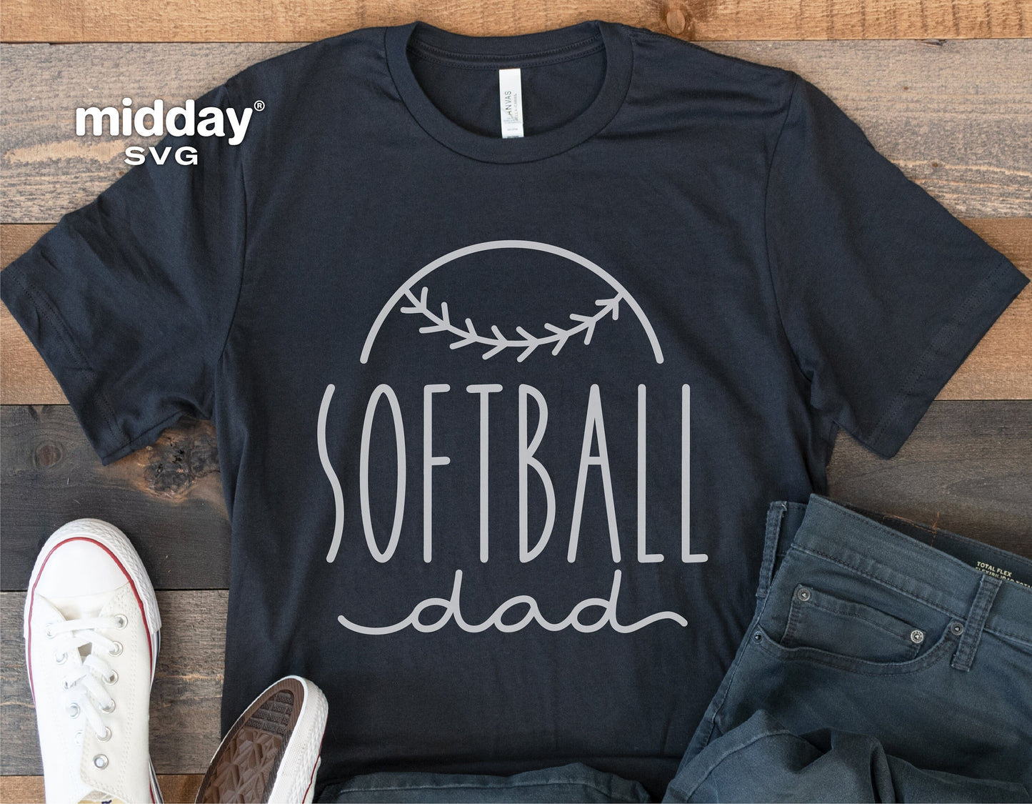 Black t-shirt with 'Softball Dad' design, paired with jeans and sneakers, ideal for customizing with Cricut or Silhouette projects.