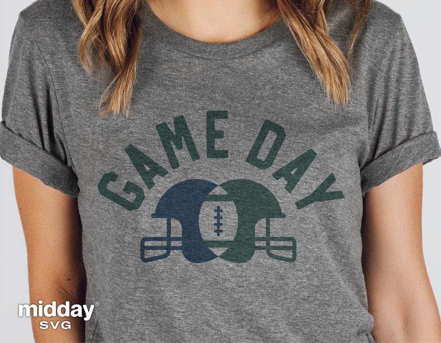 Gray t-shirt featuring 'Game Day' text with overlapping football helmets design.